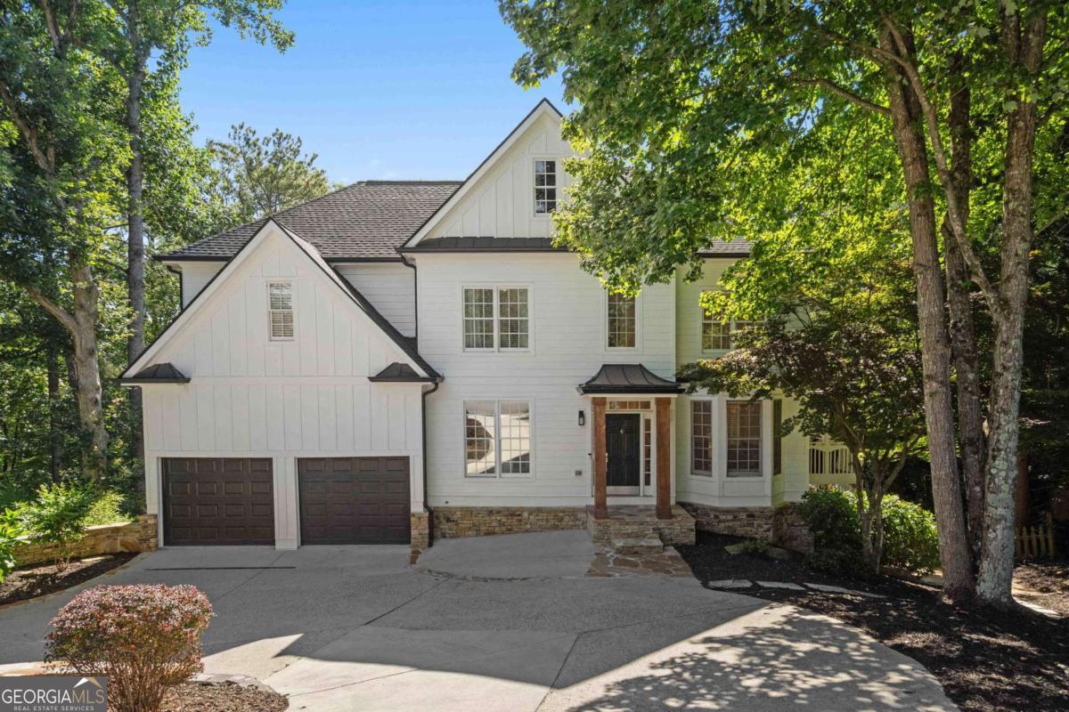 Welcome to your dream home in the highly sought-after Forsyth County! This immaculate five-bedroom, four-bath residence has been fully renovated to perfection, offering you a luxurious and comfortable living experience like no other. As you step inside, you will be immediately captivated by the elegant and modern design that flows throughout the entire home. The open concept floor plan seamlessly connects the spacious family room which is bathed in natural light, thanks to the picture windows that offer breathtaking views of the surrounding area, dining area, and gourmet kitchen, making it perfect for entertaining family and friends. The beautifully renovated kitchen is a chef's delight, featuring stainless steel appliances, sleek countertops, ample storage space, and a large breakfast bar for all to gather. Adjacent to the kitchen, you will find a cozy breakfast nook, perfect for enjoying your morning coffee while overlooking the serene backyard. The second floor boasts a luxurious master suite, complete with a walk-in closet and a spa-like ensuite bathroom. Four additional well-appointed bedrooms provide plenty of space for a growing family or guests, and the three additional bathrooms have been tastefully updated with modern fixtures and finishes. This home offers a perfect blend of indoor and outdoor living, with a spacious backyard that is ideal for hosting summer barbecues or simply relaxing in the sun. Two decks offer ample space for outdoor entertaining, while the private backyard provides a serene escape from the hustle and bustle of everyday life. Conveniently located in Forsyth County, you will enjoy easy access to top-rated schools, shopping centers, dining options, and recreational facilities. This vibrant community offers a plethora of amenities, including parks, golf courses, and a variety of outdoor activities to suit every interest. This house is truly a gem, ready for its new owners to move in and create lasting memories. Don't miss the opportunity to make this stunning, fully renovated home yours. Schedule your showing today and be prepared to fall in love with this exceptional property!