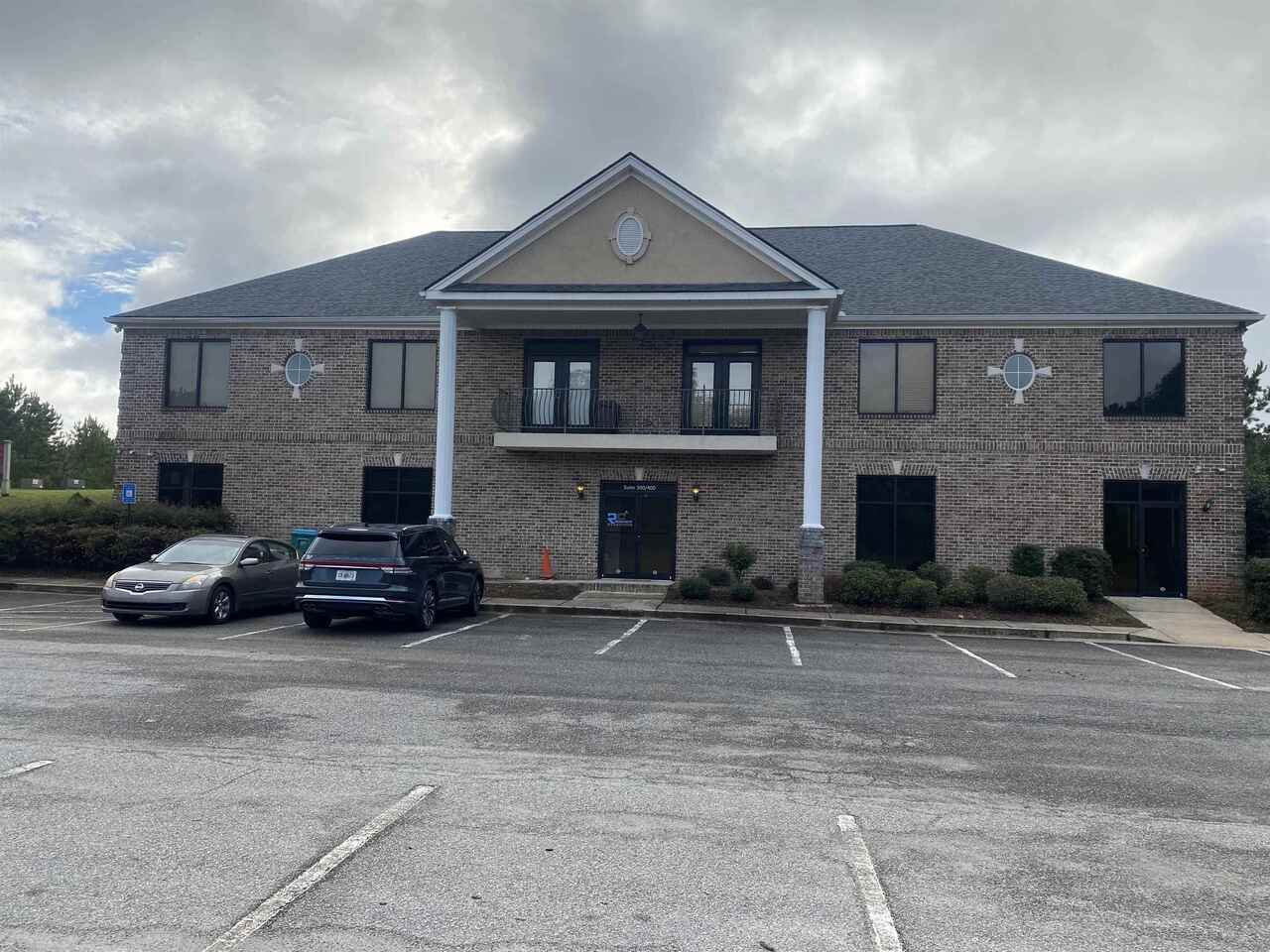 Full brick building on Great location just off Hwy 19/41 and less than a mile from Atlanta Motor Speedway. The space has 2 entrances, one from main lobby and another side/private entrance. Inside it offers 2 restrooms one of which has a walk-in shower. Parking spaces are directly in front of the space for easy customer and staff access. New carpet installed in 2020.