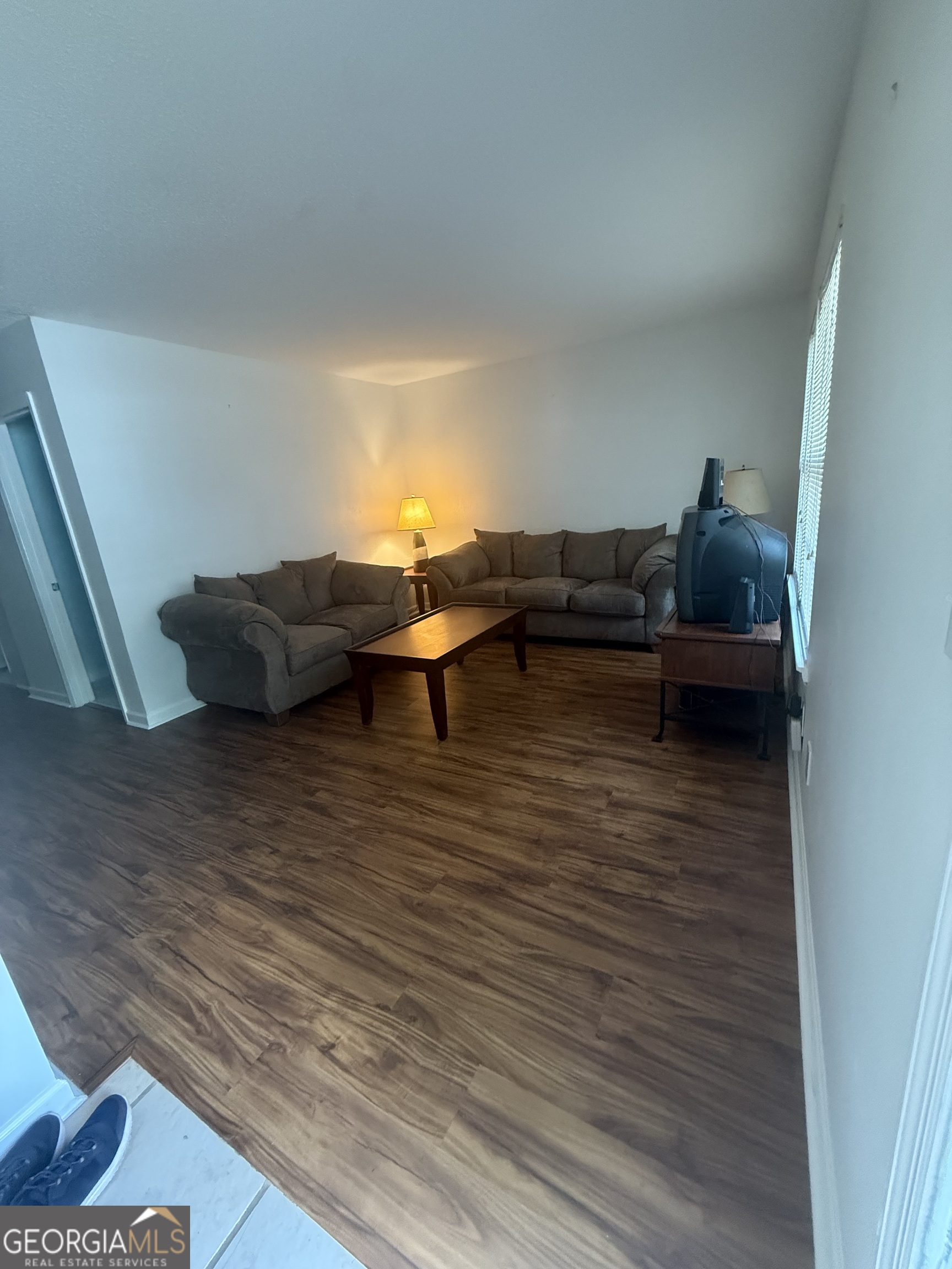 Spacious 3BR/2.5BA Townhome in Top Marietta Location! Bright and airy open floor plan with granite countertops, stylish tile flooring, and a versatile enclosed A/C sunroom for year-round enjoyment. Walk to Tumlin Park and Hickory Hills Elementary, and enjoy being just minutes from Marietta Square, Kennesaw Mountain, Kennestone Hospital, and quick I-75 access. Generously sized bedrooms offer abundant closet space, while the dedicated laundry room provides extra storage and convenience. A private back patio creates the perfect spot for morning coffee or evening relaxation. With ample guest parking and immediate rental eligibility, this home is ideal for both homeowners and savvy investors seeking a prime Marietta address.