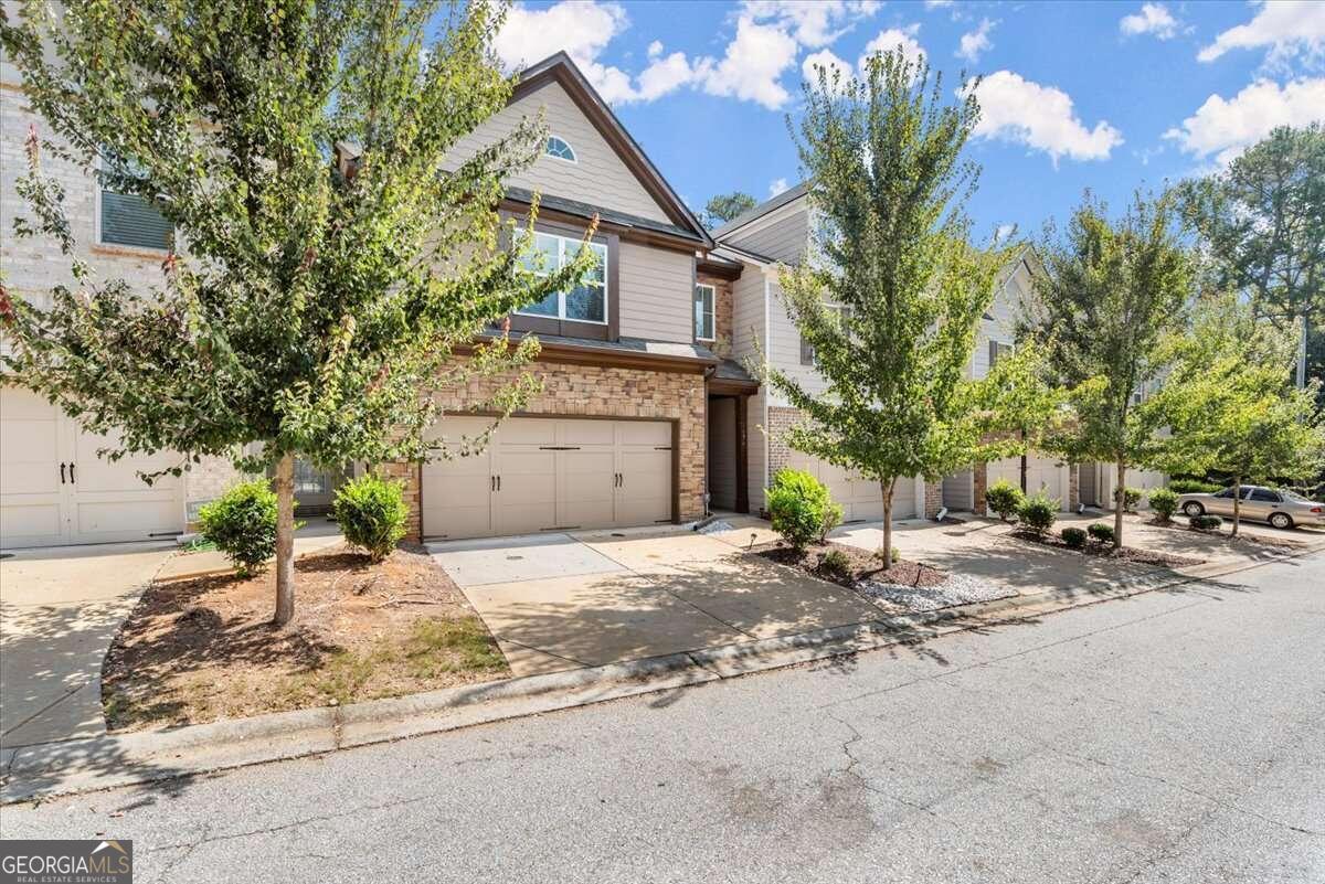 We get it !!! PRICE DROPPED $10,000!!! $5000 Towards Closing Costs & With if Qualify Preferred Lender up to $2000 additional !! Hospital just down the road !!This exceptional townhome that is now available for sale in a desirable gated community. This luxurious property has everything one could desire, including a playground, swimming pool & Clubhouse. As we enter this stunning townhome, the first thing that catches your attention is the immaculate hardwood flooring that flows throughout the main living areas in the foyer, living room, dining room , work area/flex space, 1/2 bathroom and kitchen area. The elegant tile bathrooms further add to the overall appeal and sophistication of this residence. The Second floor oversize primary bedroom is a true haven, offering ample space and comfort with large custom bathroom with tiled floors ,separate toilet area, shower & soaking tub . The living room itself is a grand space, perfect for entertaining with a cozy fireplace & bookshelves. The gourmet custom kitchen is a dream come true for any aspiring chef. With stainless steel appliances, tile backsplash, quartz counter tops and exquisite finishes, it is truly the heart of this home. The formal dining room overlooks the kitchen/living room. Just beyond the living room there is work area/flex space with 1/2 bathroom .Outside, the backyard is a private , complete with a fenced & deck area perfect for grilling or entertaining. Upstairs, there is a great TV entertaining area/Flex space/ work from home office area, two additional bedrooms & tile bathroom. Additionally, there is a separate laundry room, ensuring utmost convenience. Parking is a breeze with a spacious two-car garage, and a charming front porch welcomes guests with open arms. In summary, this townhome offers not only a luxurious lifestyle but also the comfort and convenience of a gated community. With its impressive upgrades, spacious layout, and desirable amenities, it is a true gem waiting to be discovered by its fortunate new owner. Owner is offering incentives .