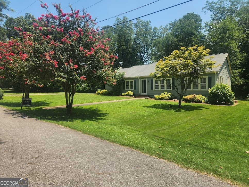 Charming ranch-style home nestled in one of the most desirable neighborhoods and a sought-after area. Just 1 mile from Sunset Hills Country Club, 1.5 miles from Carrollton Square, and just minutes from Top-Rated Schools (Carrollton City). Perfect blend of classic style and unbeatable location. Bring your vision and make this rare opportunity your Dream Home.