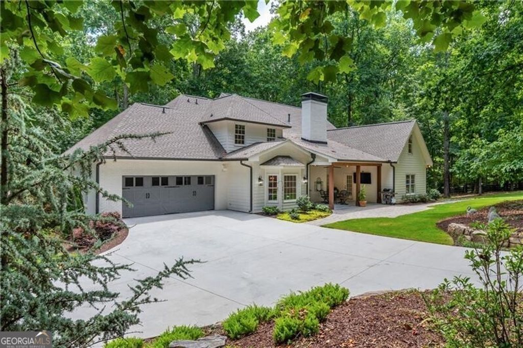 Photo of 910 Pleasant Hollow Trail, Milton, GA 30004 (MLS # 10699699)