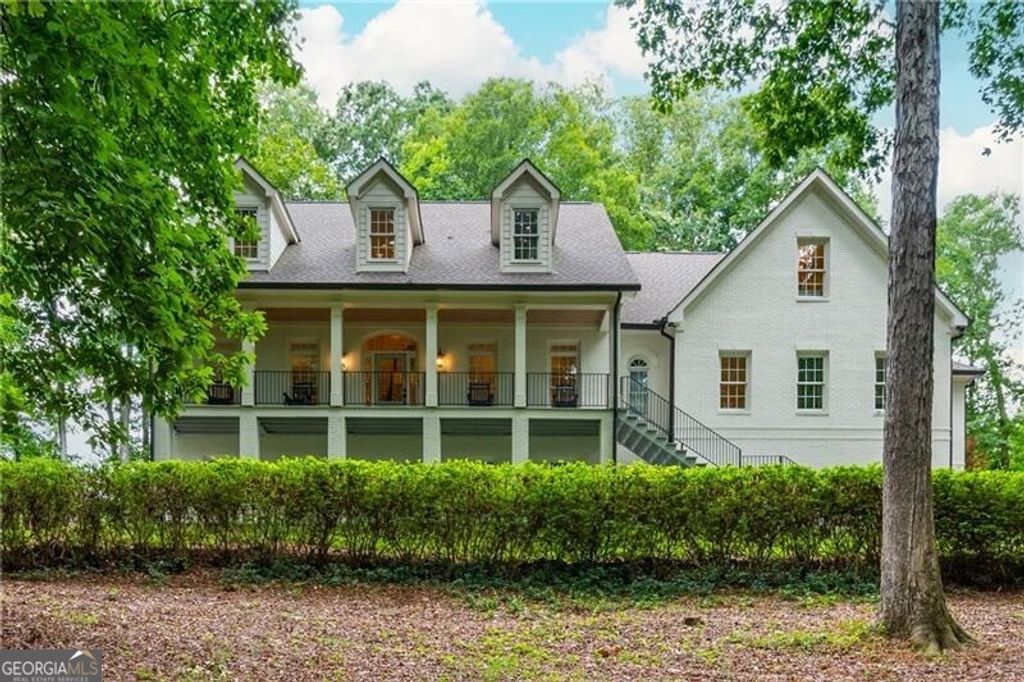 Photo of 910 Pleasant Hollow Trail, Milton, GA 30004 (MLS # 10699699)