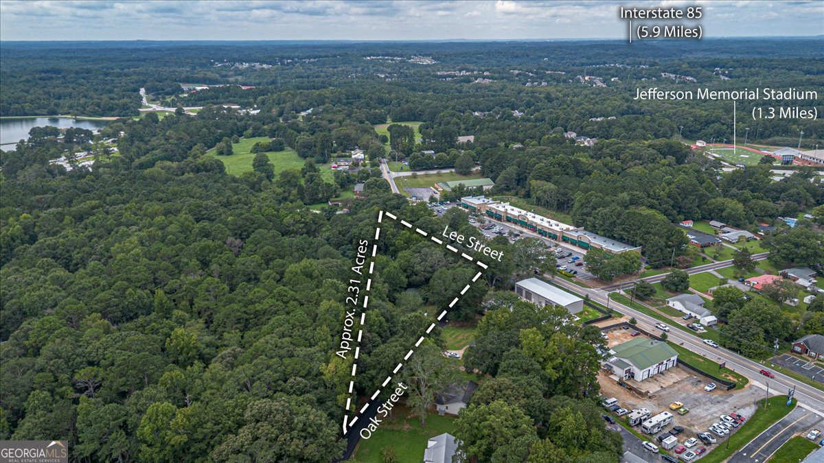 Property includes Tract 1 and Tract 2 totaling 2.310 acres. NO access to either home on the property. This property has road frontage on both Lee Street/Winder Highway and Oak Avenue. Appointment only to see property.