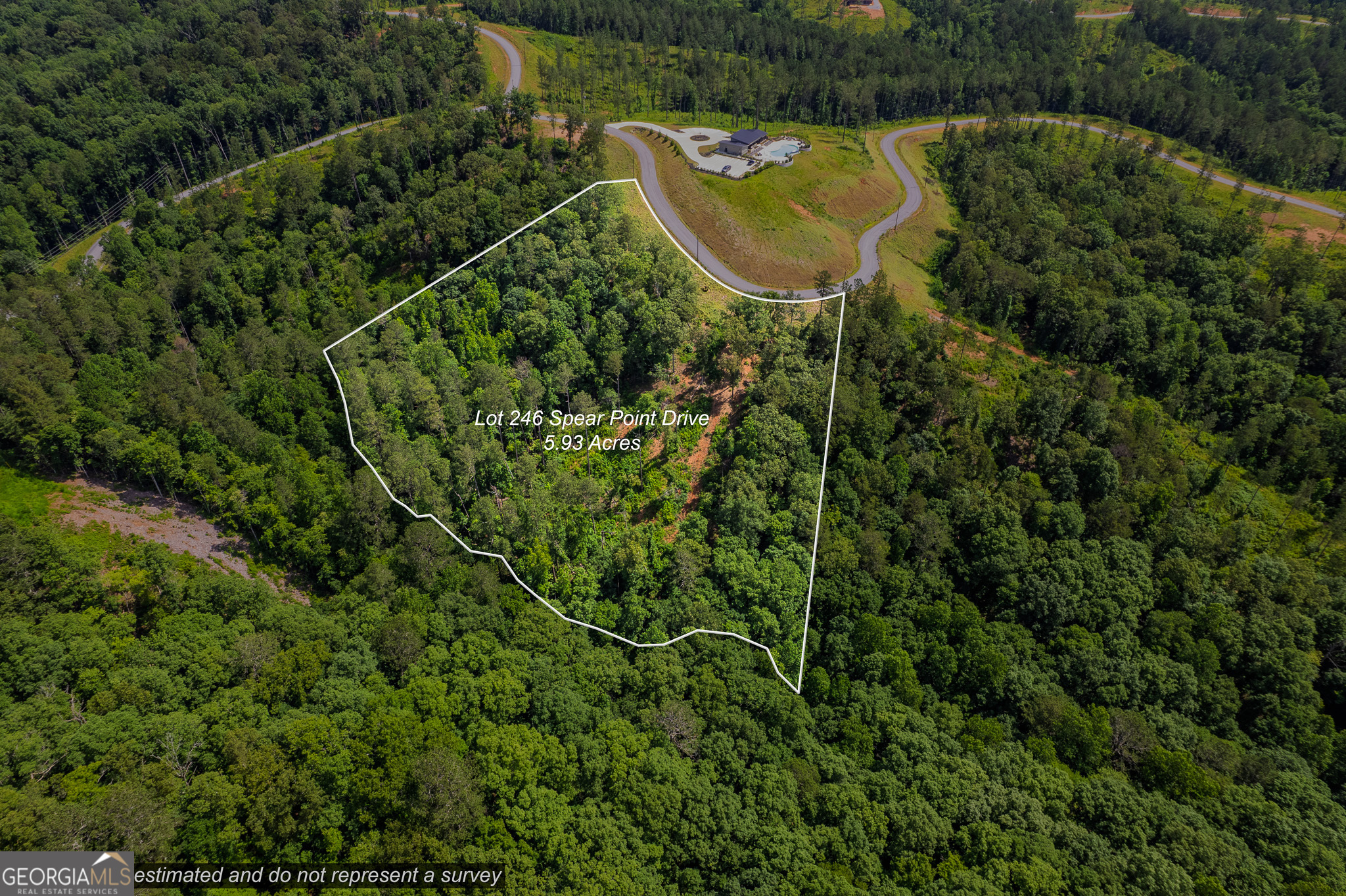 Welcome to your future mountain escape in the heart of North Georgia - where every sunrise brings breathtaking year-round mountain views and every sunset whispers peace and possibility. This stunning lot in Creekside Crossing isn't just land - it's a lifestyle. Nestled within a picturesque gated community, you'll be just a one-minute walk from the community pool, making it effortless to enjoy those warm summer days in the water or lounging poolside with a good book. Ideally located near the charming mountain towns of Ellijay, Jasper, Talking Rock, and Blue Ridge, this property offers the perfect balance of seclusion and convenience. And for outdoor lovers, Carters Lake is just 5 minutes away - renowned for its crystal-clear waters, boating, fishing, and sandy beach access. Whether you're building a weekend retreat or a full-time sanctuary, this homesite is your gateway to tranquil luxury and year-round adventure.