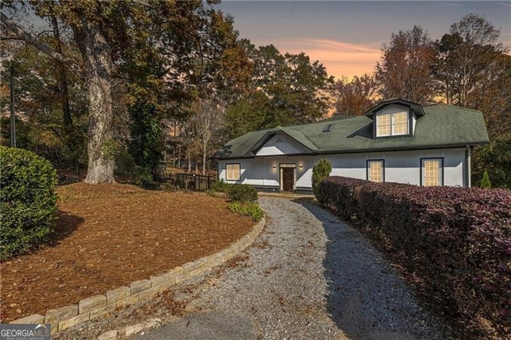 Photo of 14440 Cogburn Road, Alpharetta, GA 30004 (MLS # 10689770)