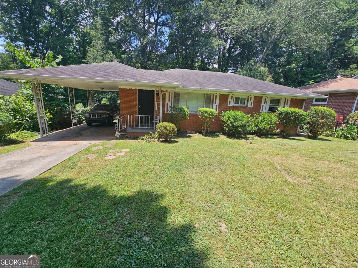 Nestled in an excellent location, this captivating 4-sided brick home exudes potential and is conveniently close to the Airport, Tyler Perry Studios, Greenbriar Mall, interstate access, shopping, and dining. This 3-bedroom, 1-full-bath, 1 half bathroom residence, showcasing original hardwood floors throughout, making it a promising prospect for investors looking to diversify their portfolio, as well as for hands-on homebuyers ready for a rewarding DIY project. The opportunities here are limitless in this great neighborhood, and it's attractively priced. Schedule your tour today! Note that traditional FHA loans are not applicable; instead only Cash, Hard Money, or Conventional financing will be considered. The buyer's agent should verify all essential details. Please submit all offers in a single PDF, and be aware that the seller has never resided on the property, therefore no seller's disclosures are available. Utilities are currently active and functioning. Please do not disturb the tenant, and the property may be delivered vacant. Please refrain from contacting the listing agent or office for details regarding the condition of the property. If the listing shows as active, it is indeed available.