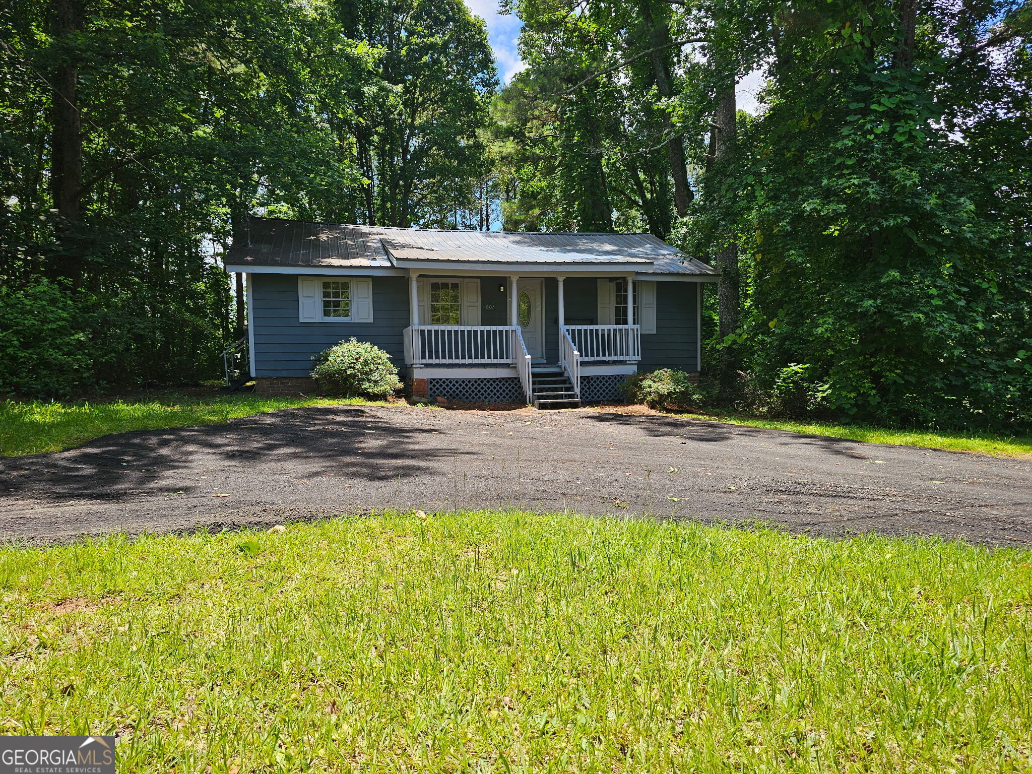 Fixer upper, 3/1 on a nice 1.51 acre lot. New flooring and a metal roof.