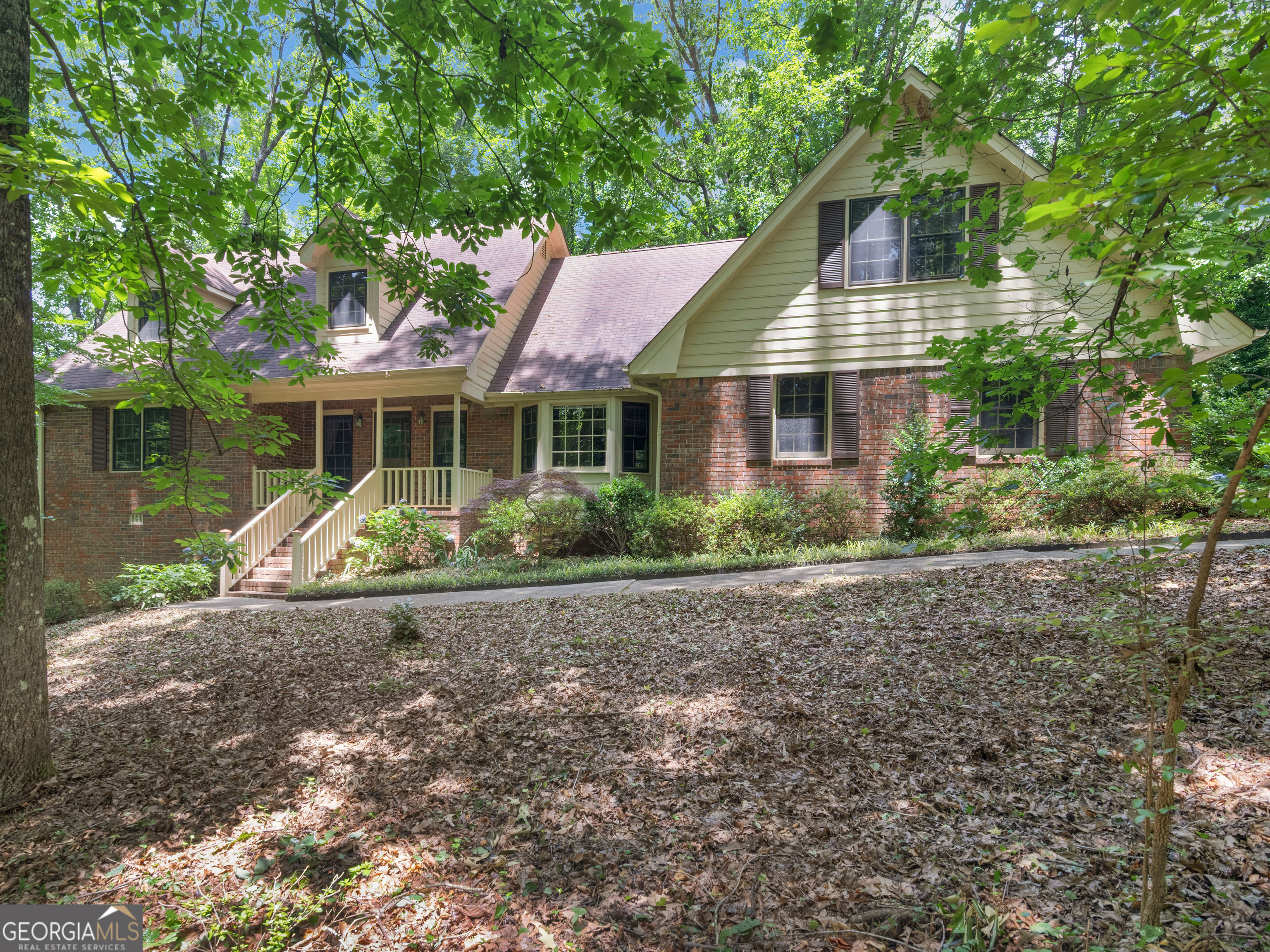 HENRY COUNTY & HENRY COUNTY SCHOOLS!!! Nestled on a quiet cul-de-sac, this custom built home by the original owner sits on a generous 1+ acre lot. A classic rocking chair front porch welcomes you into a spacious living room with a cozy wood-burning fireplace. Just off the living room, enjoy a screened-in porch--perfect for morning coffee or evening relaxation--plus an open deck with a built-in gas grill, ideal for summer cookouts. The formal dining room features a beautiful bay window and ample space for family gatherings. The kitchen offers abundant cabinetry, generous counter space, a breakfast bar, and a large eat-in area with an additional bay window. Adjacent to the kitchen is a roomy laundry area complete with upper cabinets and a pantry for extra storage. The main level primary suite features dual closets and easy access to the full bath. A dual set of staircases leads to the upper level, where you'll find two oversized secondary bedrooms, a full bathroom, and a large bonus room that spans the entire width of the home-perfect for a media room, office, or play room. Ask how you can receive up to $1500 credit by using one of our preferred lenders. Exclusions may apply.