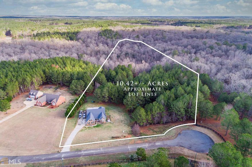 Brick home with acreage!  If you've been looking for a spacious home with acreage, your search is over.  This 4BR/3BA home is move-in ready and has room for everyone to spread out.  The main level hosts the master suite and two additional bedrooms along with a walk out porch off the dining room.  Upstairs is a bonus room which could easily be converted into a 5th bedroom. Many custom features have been added including custom tile showers and a stone fireplace. Downstairs is a fully finished basement with a large bedroom and full bath, entertainment area and a large workshop.  Opportunities abound outside with the surrounding acreage complete with wildlife flocking to the planted food plots.  Located in the back of a quiet neighborhood, this home is a true gem!