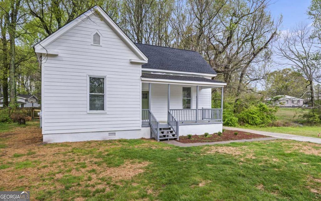 Photo of 6477 Camp Street, Riverdale, GA 30274 (MLS # 10663127)