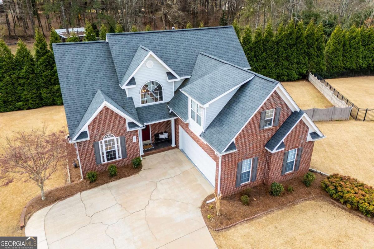 Enjoy a nice 1 1/2 story brick home, with a partially finished basement, formal dining, sun lite breakfast area, living room and family room in the basement is a plus, with a really nice theater room. This is an entertaining home tucked in a nice and quiet cul-de-sac.