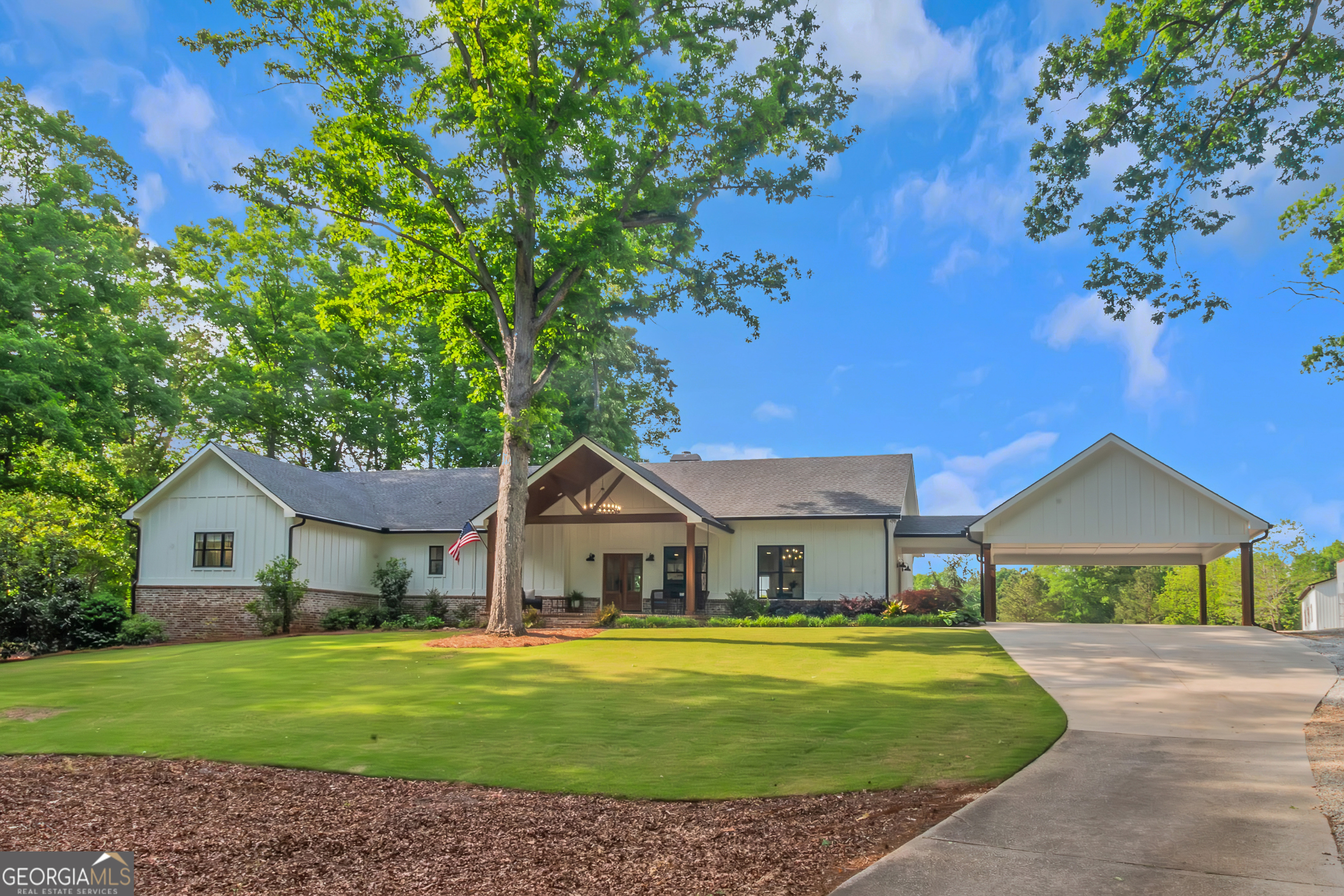 SELLER IS RELOCATING AND READY TO MAKE A DEAL!! This stunning 33-acre two home estate, located in the highly desirable Ola School District, offers a rare combination of luxury living, multi-generational flexibility, and natural beauty. Enter the property through the beautiful entrance with landscaping and brick columns. The main home is in immaculate condition and features an open floor plan that's perfect for entertaining. Beautiful hardwood floors run throughout the home, while the bathrooms are finished in elegant, timeless tile. The spacious living areas flow seamlessly into the informal dining and kitchen spaces, creating a warm, relaxed and inviting atmosphere. A large walk-in pantry with lots of storage is perfect for organization. The bedrooms are generously sized, and the master suite is truly a retreat-offering plenty of room for a private seating area, and a spa-like master bathroom with soaking tub and large walk-in shower. Outdoor living is just as impressive, with large front and back porches that provide the perfect setting for entertaining or enjoying peaceful views of the surrounding land and beautiful landscaping. The finished basement adds tremendous value and versatility, with space that can be used as additional living area, a home office, play room, or extra storage. The home also features two 50-gallon water heaters and a whole-home recirculating pump, as well as a fully encapsulated crawl space with dehumidifier. The second home on the property offers 3 bedrooms and 2 bathrooms and is ideal for a guest house, in-law residence, or potential rental income. Both homes are well-positioned on the land to provide privacy and maximize the use of the property's natural features. The land itself is a beautiful blend of open pasture and mature woods, and a spring-fed creek runs through the property, adding to its charm and usability. Two barns provide excellent space for storage, hobby farming, or entertaining. Wildlife, including deer, are frequently seen on the property, making it perfect for hunters or those who simply enjoy watching nature. Properties like this-combining size, condition, location, and versatility- present a truly unique opportunity and are extremely rare in this area! Listing agent related to seller.