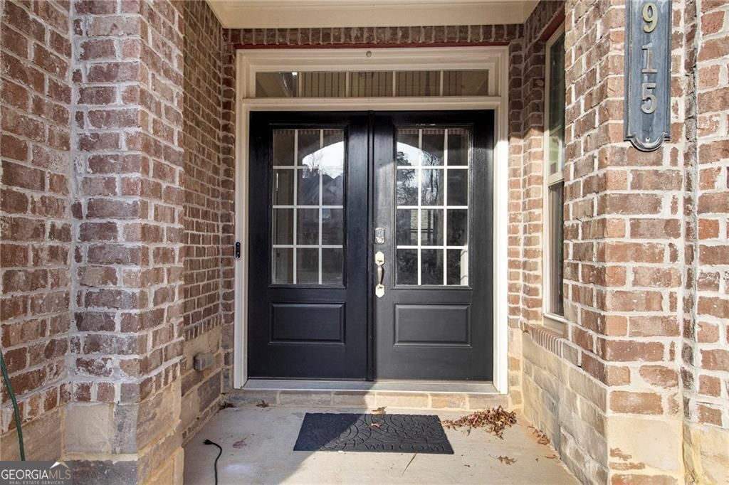 Photo of 915 Elmsbrook Lane, Alpharetta, GA 30004 (MLS # 10679509)