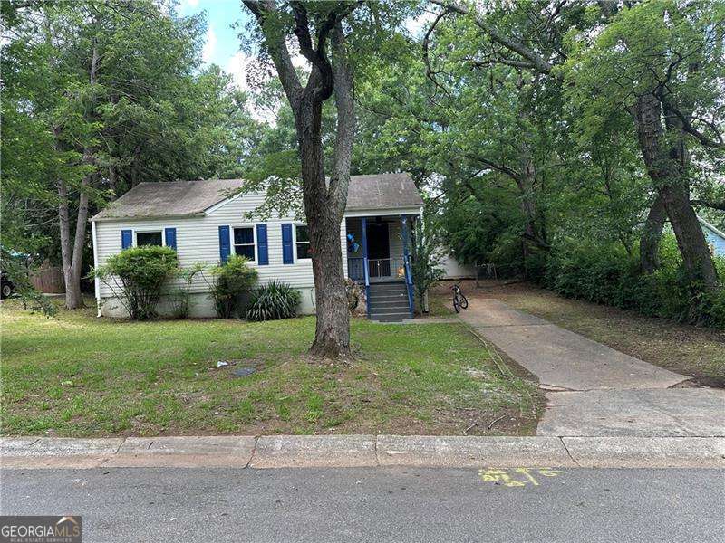 LOCATION.,LOCATION...3 Bedrooms, 2 bathrooms. Hardwood Floor. Aluminum/Vinyl. Open Frame Porch. Patio/Wood Deck. Close to I-75/285/85. Close to Downtown Marietta Square and near of Marietta Museum of History. SOLD AS IS. NO SELLER'S DISCLOSURE AT THE PROPERTY.