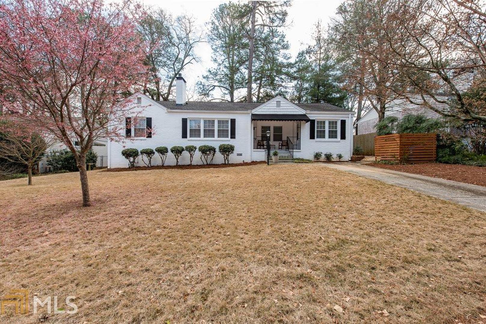 Completely renovated brick ranch in desirable Medlock Park. Immaculate condition with pristine hardwood floors, new paint throughout, newer roof, HVAC, moldings and windows. Entertain lavishly in large dining room with gas fireplace, spacious living room with bay window and updated kitchen with sunny breakfast nook. Generous master suite offers an Elfa closet system and updated bath featuring custom tile shower. Two additional bedrooms and an additional full bath PLUS half bath complete the living accommodations. A huge south-facing sunroof spans the rear of the house and can be used for additional living space, exercise room or storage. Custom landscaping in front and a fenced back yard with deck offer all manner of outdoor living options.