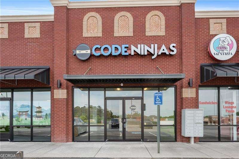 Prime Retail Space for Lease Co 2538 Cedarcrest Rd, Suite 109, Acworth, GA 30101 Position your business in the heart of Paulding County with this exceptional 2,800 SF retail suite located in a vibrant shopping center on Cedarcrest Road. Surrounded by popular anchor tenants such as Sal's Pizza, Atami Steak & Sushi, Cielo Blue, and RE/MAX, this space benefits from steady foot traffic and excellent visibility. Built in 2008, the unit features a spacious, modern layout with a welcoming reception area, restrooms, and a kitchenette. The bright, open design is complemented by a large storefront window that brings in abundant natural light. Additional highlights include: Ample parking with 50+ spaces Dual entrances for convenient access Rear delivery/loading doors ADA-compliant restrooms High daily traffic counts Zoned B1, suitable for a variety of retail or service uses The location also offers easy access to utilities including electricity, gas, sewer, and cable. Positioned in a well-maintained brick building with 465 feet of road frontage, this site is ideal for growing your business in a high-demand area.