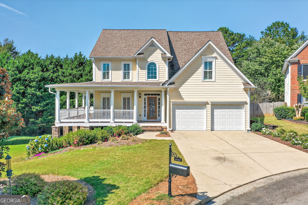 Welcome to this stunning 4-bedroom, 2.5-bath home nestled on a spacious cul-de-sac lot in the coveted Hamilton Corners swim and tennis community. From the moment you arrive, the charming wraparound porch beckons you to unwind and enjoy the tranquil surroundings, setting the tone for the warm, inviting atmosphere inside. Step through the front door and be greeted by gleaming hardwood floors that flow seamlessly throughout the main living areas. The open-concept floor plan is designed for modern living, with the family room effortlessly connecting to the kitchen-making entertaining, family dinners, and cozy nights in equally enjoyable. Natural light fills every corner, highlighting the home's thoughtful layout and timeless finishes. The oversized primary suite is a true retreat, complete with a sitting area ideal for reading or relaxing and a generous walk-in closet to accommodate even the most extensive wardrobe. The additional bedrooms are spacious and versatile, perfect for family, guests, or a home office. Outside, the expansive deck provides an inviting space for summer barbecues, morning coffee, or quiet evenings overlooking your private lot. With an unfinished basement offering endless potential for a home gym, playroom, or additional living space, this home combines comfort, flexibility, and charm. Located in Hamilton Corners, one of the area's most desirable communities, you'll enjoy access to fantastic swim and tennis amenities while being part of a vibrant neighborhood. With its private setting, thoughtful design, and plenty of room to grow, this home truly offers a lifestyle of comfort, convenience, and charm.