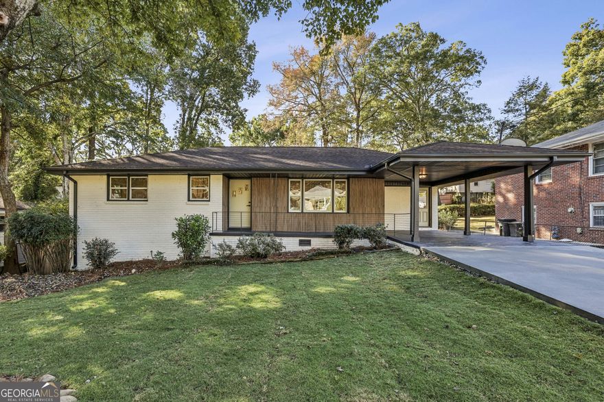 Fully Renovated Modern Brick Ranch in East Atlanta! Located just Blocks from Brownwood Park and Steps to East Atlanta Village, enjoy easy access to the Farmers Market, Popular Restaurants, Coffee Shops, and Nightlife   all in one of Atlanta's most sought-after neighborhoods. Quick Access to I-20 makes commuting simple. Curb appeal abounds with a Flat, Grassy Front Yard, Fresh Landscaping, and Chic Wood Accents that highlight the modern fa ade. Step inside to discover Gorgeous Hardwood Floors, Recessed Lighting, and an inviting Open-Concept Living Area filled with Natural Light from Large Picture Windows. The Designer Kitchen showcases White Shaker Cabinets, Quartz Countertops and Island, Stainless Steel Appliances, and a Stylish Tiled Backsplash   all flowing seamlessly into the Dining Area with Glass Doors leading to the Deck, perfect for Al Fresco Dining or Entertaining. The Primary Suite on Main offers a Luxurious Ensuite Bathroom with a Double Stone Vanity, Modern Fixtures, and a Glass-Enclosed Shower. Two Additional Bedrooms share a Beautifully Renovated Hall Bathroom with a Double Vanity and Shower/Tub Combo. Head Downstairs to find a Fully Finished Daylight Basement featuring a Fourth Bedroom, Full Bathroom, and Spacious Flex Room ideal for a Home Office, Gym, Media Room, or Playroom   offering endless possibilities to suit your lifestyle. Step Outside to the Fully Fenced Backyard with a New Deck and Large, Grassy Lawn   perfect for Gardening, Play, and Outdoor Gatherings. Indulge in Atlanta's best dining and coffee at Gunshow, Muchacho, Banshee, Argosy, and Pollo Primo, all just minutes away. Conveniently located near Downtown Atlanta and Hartsfield-Jackson International Airport, this home perfectly balances Peaceful Neighborhood Living with Premier City Access.