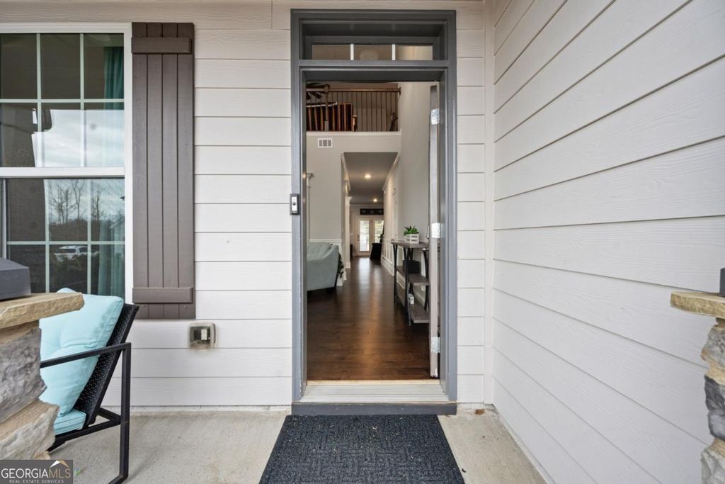 Photo of 6780 Rambling Vale, Cumming, GA 30028 (MLS # 10699402)