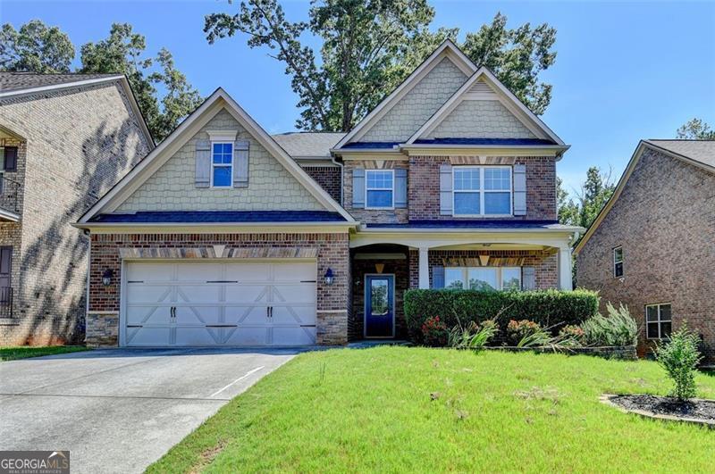 Welcome to this stunning 4-bedroom, 2.5-bath, move-in ready home located in the highly sought-after gated community of The Gates at Johns Creek. Boasting 2,924 sq. ft. of living space and a timeless four-sided brick exterior, this home combines elegance, comfort, and modern convenience. Step inside to find a bright, open floor plan with fresh paint, new carpet, and thoughtfully designed living spaces. The chef's kitchen features granite countertops, a large island, brand new stainless steel appliances, pantry, and ample cabinetry-perfect for everyday living and entertaining. Flowing seamlessly from the kitchen is a spacious dining area and open living room, creating a warm and inviting atmosphere. Upstairs, all bedrooms are generously sized, including a luxurious master suite with a double vanity, soaking tub, separate shower, and two oversized walk-in closets. Additional bedrooms are well-appointed, offering comfort and versatility for family or guests. The home also offers a private backyard, ideal for outdoor gatherings or quiet relaxation. Situated in a gated community with surveillance for added security, residents enjoy peace of mind along with the benefit of being in an area served by top-rated schools. With its prime location, beautiful upgrades, and desirable floor plan, this home is also an excellent leasing opportunity. Don't miss your chance to live in one of Johns Creek's premier communities-schedule a tour today!