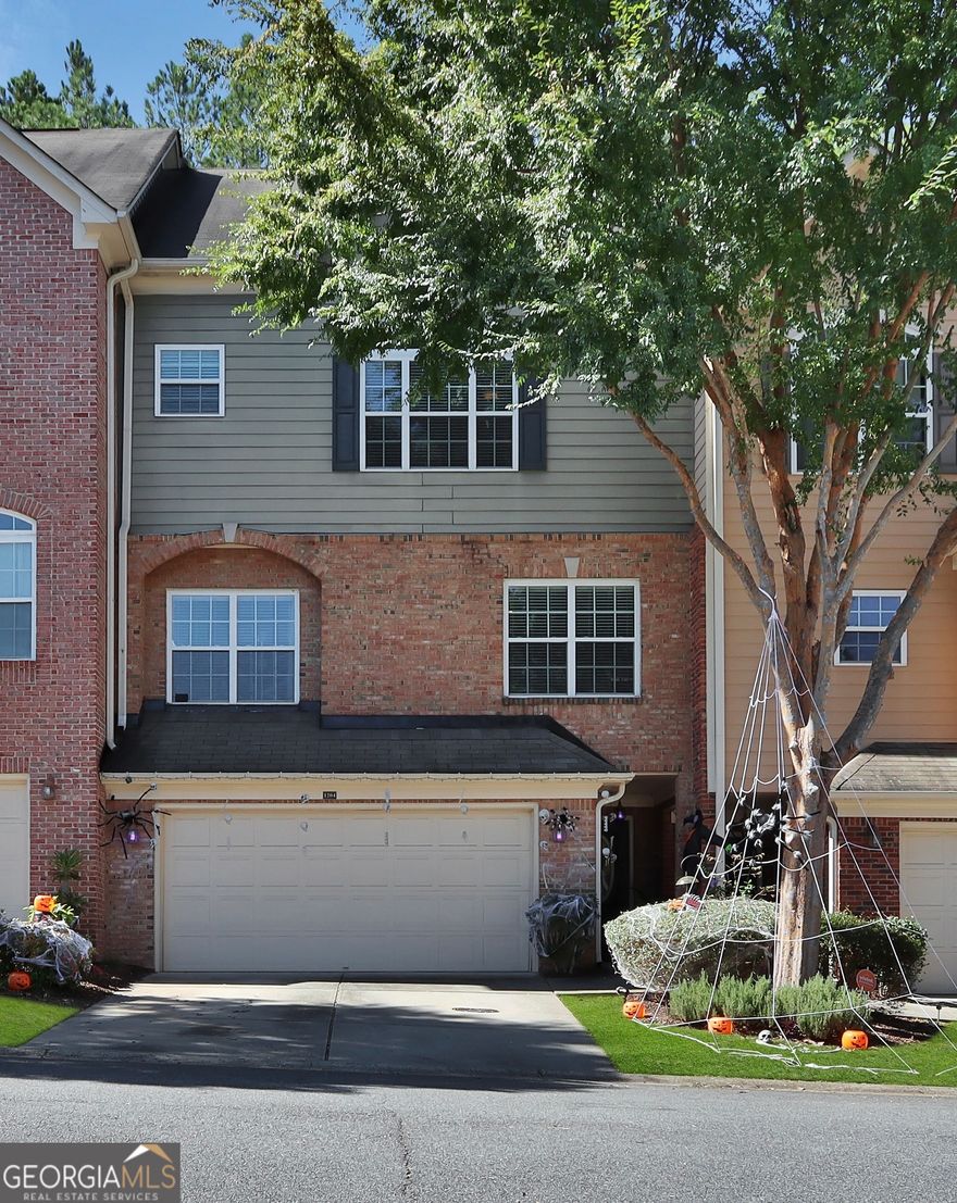 Welcome to Glen Ivy, a stunning gated townhome community just minutes from the vibrant Marietta Square! This highly sought-after neighborhood offers a sparkling community pool and an unbeatable location, with easy access to I-75 for seamless commuting.  This spacious townhome is thoughtfully designed for both comfort and entertaining. The terrace-level entry features a versatile bonus room with a full bathroom, perfect for guests, a home office, or a media space.  On the main level, the gourmet kitchen is a chef's dream, seamlessly connecting to the dining area and family room-ideal for hosting friends and family.  The second level boasts two generously sized bedrooms and two full bathrooms, including the luxurious owner's suite. You'll love the oversized bathroom with its double vanity and large walk-in closet.  The third level offers a flexible loft space, perfect for a playroom, home gym, or an additional bedroom with bathroom to accommodate guests or family members.  Glen Ivy combines convenience, luxury, and charm, creating the perfect place to call home. Don't miss the chance to make this exceptional property yours!