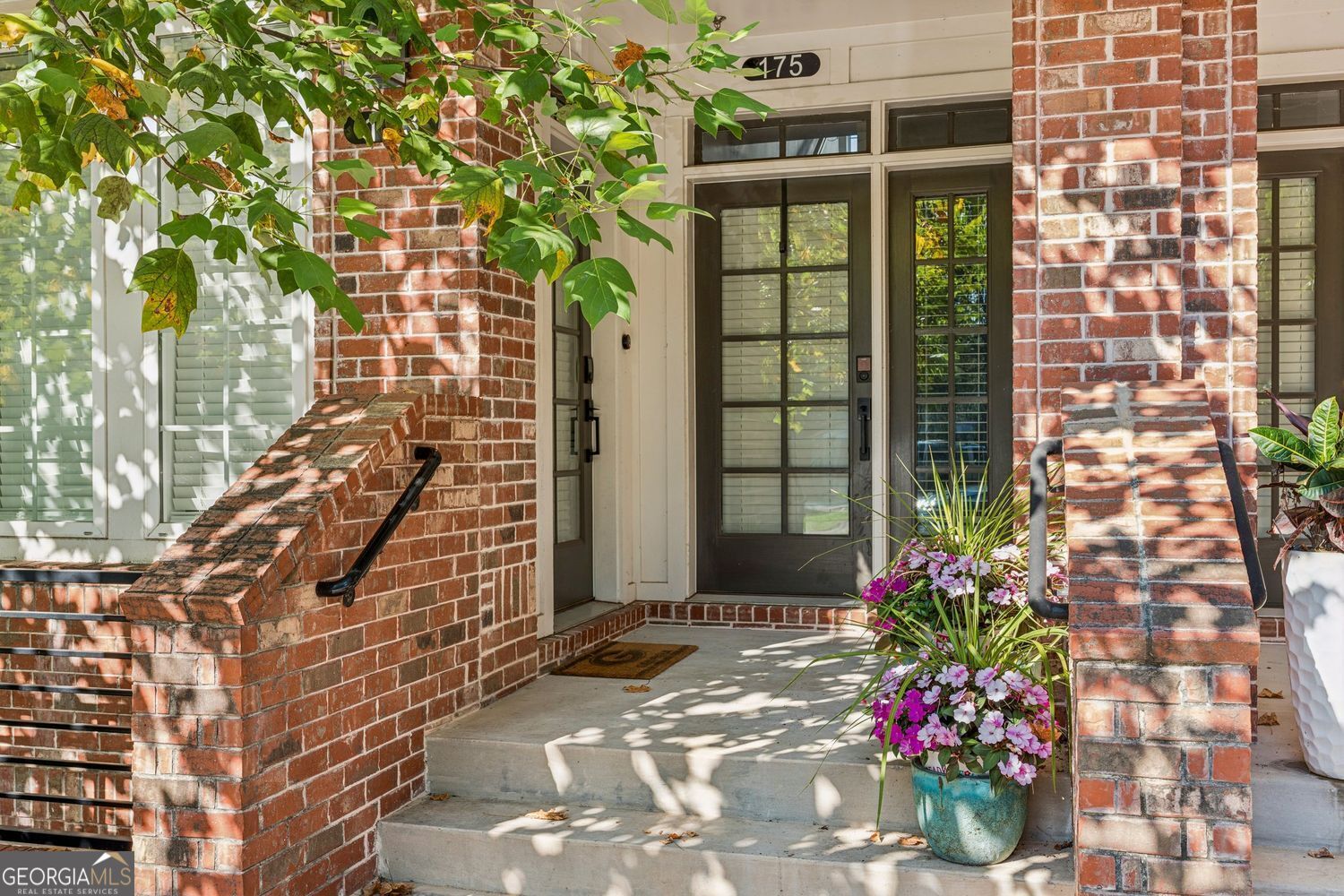 Stunning Top-Floor Condo at The Maxwell! - Walk to Everything! Live within walking distance of everything Alpharetta has to offer in this beautifully upgraded home. Step inside and you'll notice designer touches throughout-from shiplap accents and a custom entertainment setup in the Family Room to remote-controlled Hunter Douglas shades, pendant lighting, and plantation shutters in the owner's suite. The open floor plan is perfect for entertaining. The modern Kitchen shines with concrete-finish quartz countertops, subway tile backsplash, spacious island, stainless steel appliances, and crisp white cabinetry. The owner's suite boasts tall ceilings, a ceiling fan, walk-in closet, and a luxurious bath with a double shower (featuring two shower heads and room for a bench) plus an expansive vanity with ample storage. A convenient half bath is also attached to the owner's suite. This modern layout also includes a flex space with windows and an oversized closet, ideal as a home office, nursery, or guest suite. Extra perks include multiple storage closets, a 1-car garage with a driveway long enough for a second vehicle, and additional guest parking nearby. All this just steps away from The Maxwell Retail, the Alpha Loop, and downtown Alpharetta, where you'll love weekly food trucks, farmers markets, festivals, dining, shopping, and entertainment. With quick access to GA-400, Milton, and Roswell, the location couldn't be better.