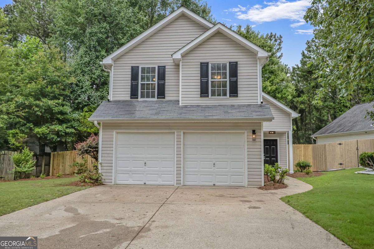 Welcome to 161 Stoneforest Drive, a beautifully renovated home nestled in the family-friendly Parkview at Towne Lake neighborhood. Enjoy all the perks of Towne Lake living, including convenient access to top-rated schools, parks, shopping, and dining. This move-in ready 3-bedroom, 2.5-bath home has been fully updated from top to bottom-featuring a brand-new HVAC system, fresh interior and exterior paint, updated flooring, modern bathrooms, and a fully redesigned kitchen with new cabinets and finishes. The private backyard has also been professionally landscaped, perfect for relaxing or entertaining. Parkview at Towne Lake offers its own swim and tennis amenities, and the HOA maintains all front yard landscaping for low-maintenance living. Don't miss this rare opportunity to own a turnkey home in one of Woodstock's most sought-after communities.
