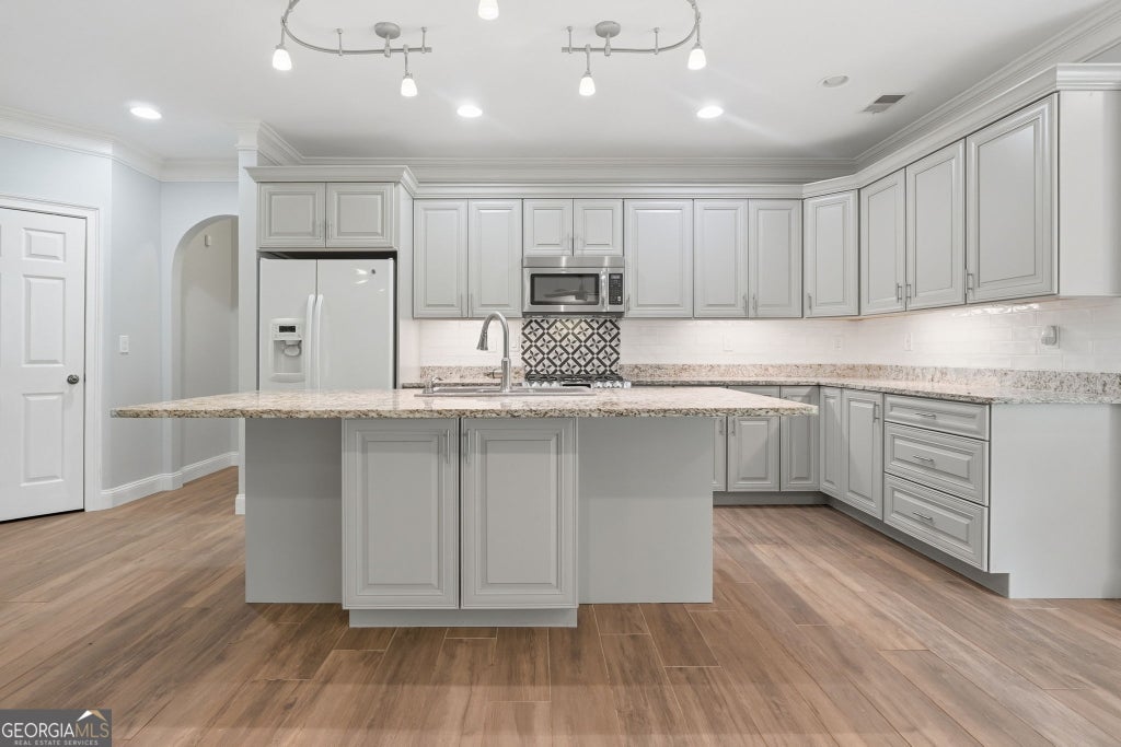 Photo of 5369 Secretariat Lane, Sugar Hill, GA 30518 (MLS # 10777923)