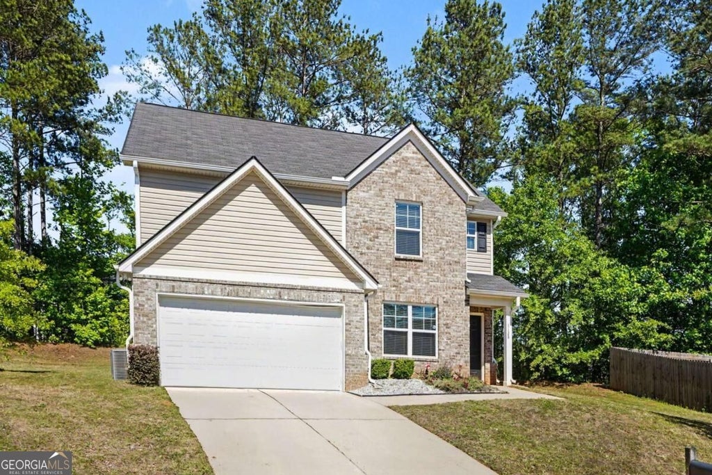 Photo of 1128 Oak Hollow Lane, Hampton, GA 30228 (MLS # 10853875)