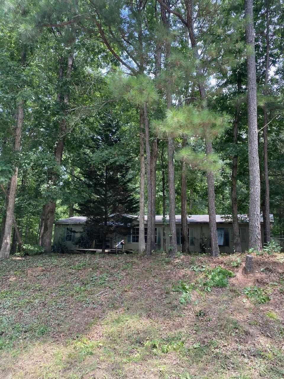 Investment Opportunities With This One! Come Check Out This Nestled 2.13-Acre Lot/ Property Includes: 1991 Mobile Home on Property, 1,716sf. Home Needs a Complete Renovation or Can Be Removed. Additional 25x21 Brick/Framed Carport. 2004 Bored Well. Well Services the Mobile Home and Property, Well Pump is New. Power services Well and Mobile Home. 10x14 Utility Building Included In Sale As Well. Property Is Located Only 1 Mile from Jackson Lake/ Bear Creek Marina & Restaurant, 16 Miles from Monticello, 15 Miles from Covington Square, 51 Miles SE from Atlanta.