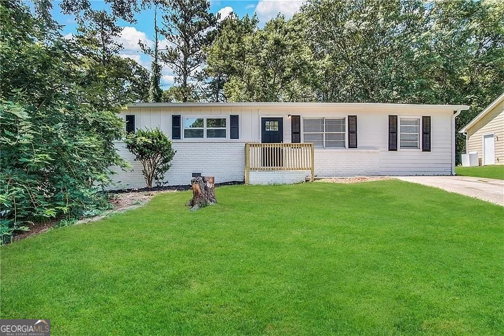 A beautifully renovated 5-bedroom, 2-bathroom ranch home. This home features stylish updates including stainless steel kitchen appliances, granite countertops, and updated flooring throughout. Situated on a large level lot. Conveniently located near shopping, dining and more! Do not miss this great opportunity!