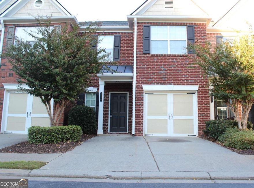 Stunning Smart Townhouse for Rent in Johns Creek!    Welcome to a beautifully upgraded 3-bedroom, 2.5-bath townhouse in the heart of Johns Creek that stands out in both comfort and convenience.    From the moment you enter, you'll appreciate sophisticated upgrades such as recessed lighting throughout the home and popcorn ceilings that have been expertly scraped for a contemporary finish. As you enter the kitchen you'll enjoy modern touches from sleek white cabinetry paired with elegant granite countertops and brand-new Whirlpool appliances that include a microwave, refrigerator and gas stove. With smart home features you will control your environment effortlessly with Alexa, from thermostats to lighting and garage doors. Everything is at your voice command or with the use of downloadable apps on your phone for convenient seamless living.     Additional features include three spacious bedrooms and two and a half baths with luxury vinyl plank flooring on the main level and carpet for the bedrooms.    The home is situated directly across from Johns Creek High School and State Bridge Elementary, and just a short walk to major conveniences like Target, Publix, Whole Foods, Home Depot, Regal Cinema, and Starbucks.      This townhome is the perfect blend of luxury, modern convenience, and prime location. Don't miss out on making this your new home!
