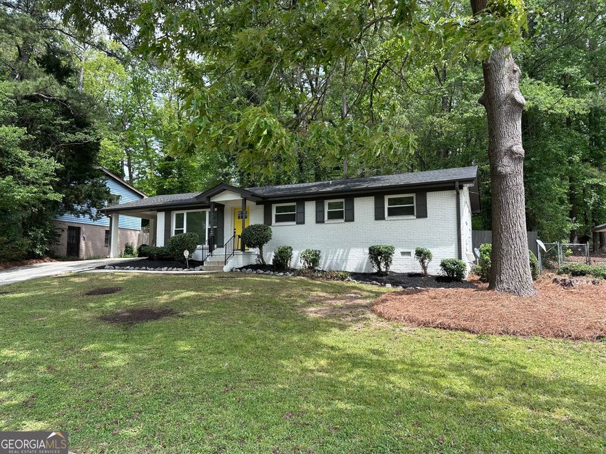 Welcome to a beautiful fully renovated all-brick gem nestled in one of Atlanta's cozy neighborhoods! All Electric.  This 3-bedroom, 2-bath home blends modern upgrades with charm, offering an combination of comfort, style, and location. This home includes a brand-new upgraded kitchen with granite countertops, new cabinetry, and stainless steel appliances.  Major updates have already been done for you, including a new roof, new HVAC system, and plumbing throughout - everything you need for a move-in-ready experience! Featuring an open floor plan designed for today's lifestyle - perfect for both everyday living and entertaining.   The three bedrooms offer comfortable retreats, while the two bathrooms have been updated with contemporary fixtures and finishes. The private backyard - accessible from the kitchen via a patio door - provides a quaint outdoor space.  Location is everything, and this home delivers! Conveniently located minutes from I-285, you'll have quick access to major Atlanta destinations. You're just moments away from Camp Creek Marketplace, Publix, Target, LA Fitness, and a wide variety of popular eateries. Enjoy live entertainment just around the corner at Wolf Creek Amphitheater, and when it's time to travel, you're only a short drive from Hartsfield-Jackson Atlanta International Airport.  This fully renovated home is ready to welcome you - schedule your private tour today!