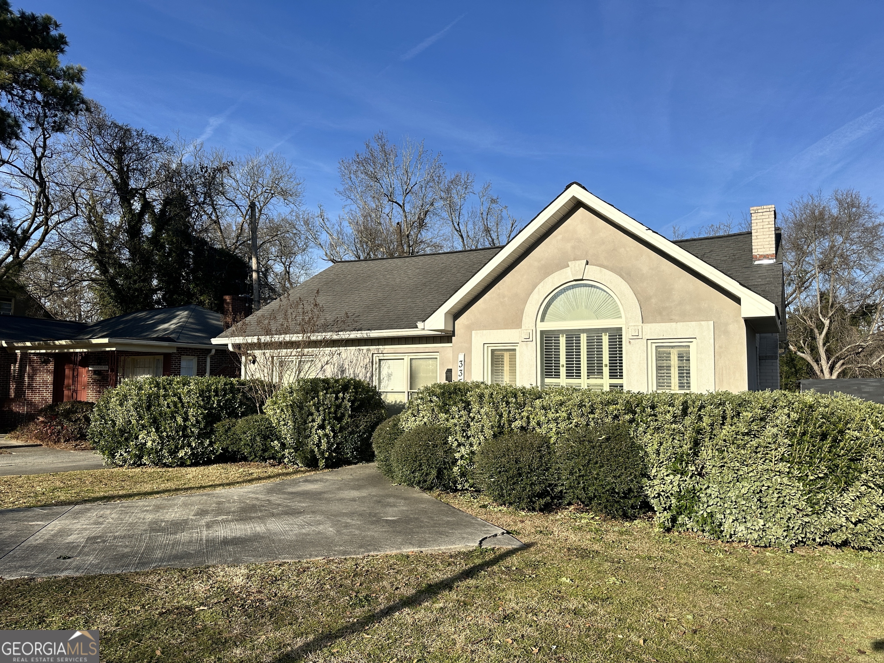 Located on the highly trafficked Vineville Avenue in the heart of Macon, this professional office space offers an ideal combination of convenience, functionality, and visibility. With a dedicated parking lot and a storage garage in the back featuring a roll-up door, this property is designed to support a variety of business operations. Currently configured with 11 workspaces, including a conference room, the layout is both versatile and efficient. The central reception area features a large built-in desk with abundant storage, perfect for welcoming clients and managing operations. Additional amenities include a breakroom, one bathroom, and several oversized closets for office supplies, inventory, or equipment. There is room to add a second bathroom as well. Recent updates include brand-new flooring throughout, giving the space a fresh and modern look. This space is well-suited for a variety of professional uses, including real estate offices, law firms, marketing agencies, accounting practices, boutique medical practices, or med spas. Currently home to a real estate office and previously occupied by midwifery and construction businesses, this property offers proven versatility for a range of industries. Located within a thriving professional community-neighbors include a photography studio, attorney's office, and property management company-this is the perfect spot to establish or expand your business. Don't miss this opportunity in a prime Macon location! Seller is GA licensed agent.