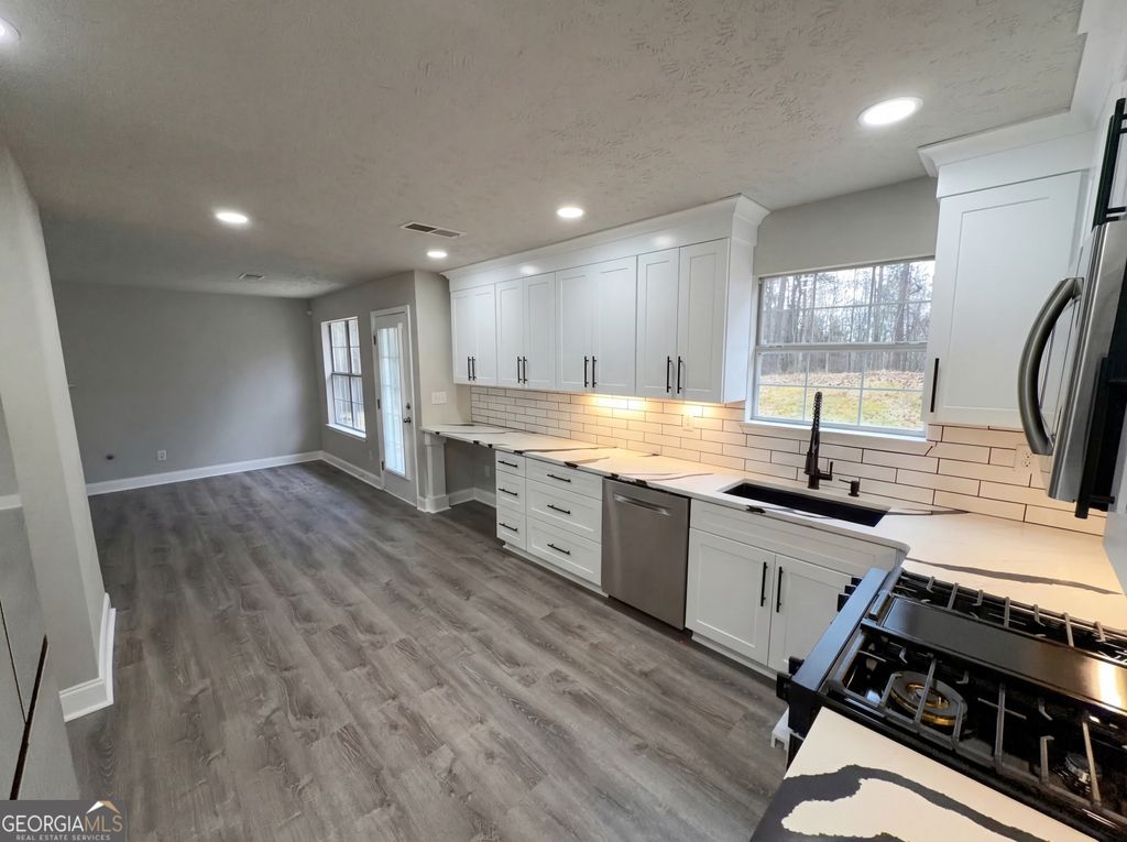 Photo of 7259 Williams Road, Flowery Branch, GA 30542 (MLS # 10702393)