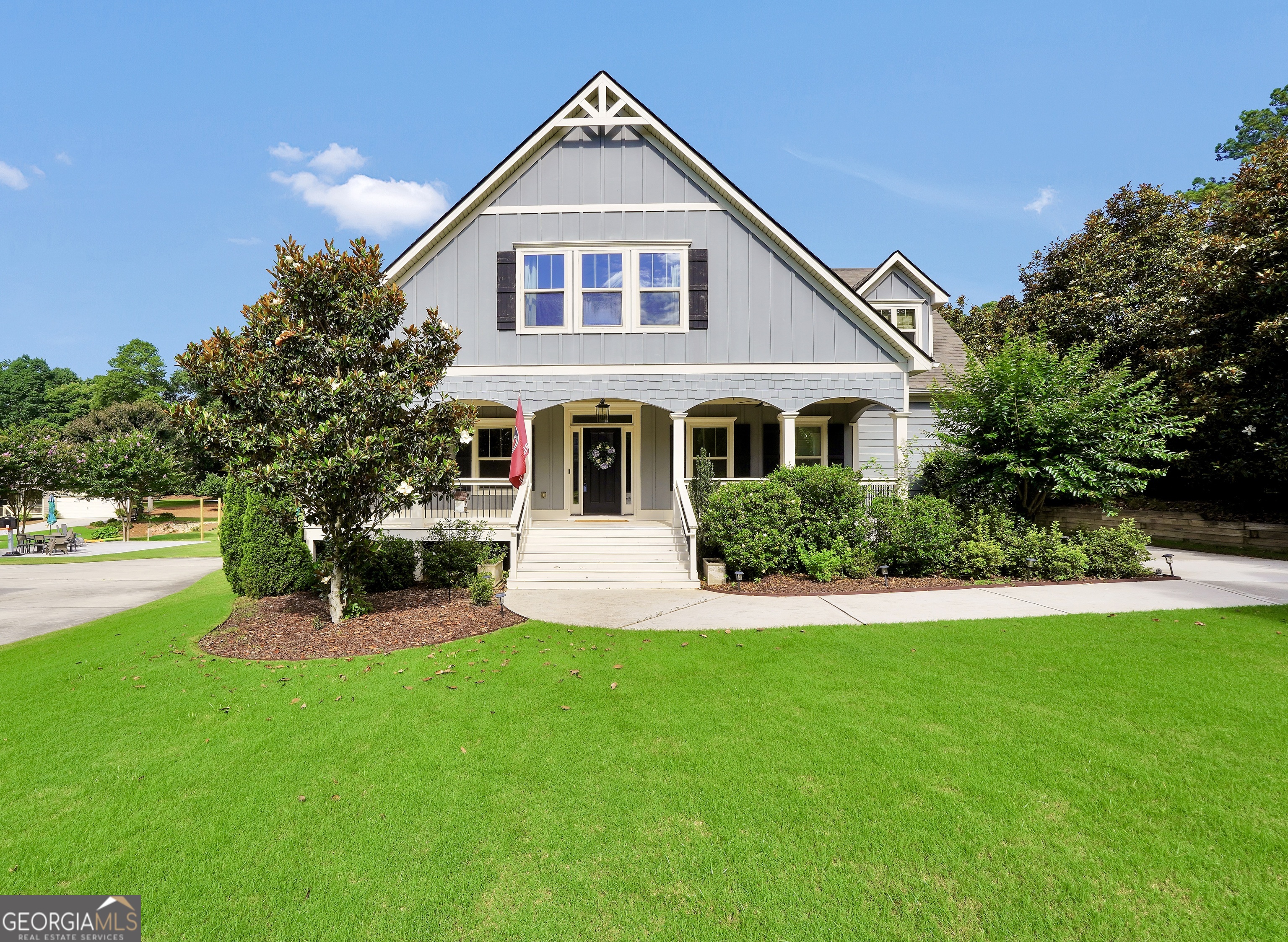 Nestled in the heart of Fayetteville, this delightful home offers a harmonious blend of comfort and convenience. Just minutes from Downtown Fayetteville, residents can easily access local restaurants, shops, and attractions, ensuring a vibrant lifestyle. Upon entering, you're greeted by an open floor plan that seamlessly connects the spacious living room to the well-appointed kitchen. The kitchen features stainless steel appliances, elegant granite countertops, an eat-in breakfast area, and a convenient walk-in pantry. To the left of the entry, a traditional dining room awaits, perfect for hosting gatherings. The main floor offers an oversized master bedroom with a distinctive coffered ceiling and extra space for a separate sitting area. The attached master bathroom offers a large garden tub, a separate shower, and a generously sized walk-in closet, creating a private retreat. A separate laundry room with a sink on the main level adds to the home's functionality and convenience. Upstairs, you'll find three nicely sized additional bedrooms, including a Jack and Jill suite with a shared bathroom, providing comfort and privacy for guests. Another full bathroom on the second floor ensures added convenience. The almost half-acre yard is a standout feature, providing ample space for outdoor activities and relaxation. One of the highlights of this home is the full-length rocking chair porch, offering a perfect spot to unwind and enjoy the surroundings. Recent upgrades include the replacement of the HVAC system, furnace, and carpets within the last two years, ensuring modern comfort and efficiency. This home is truly move-in ready, offering a blend of charm, comfort, and convenience. Don't miss the opportunity to make this Fayetteville gem your new home. Schedule a visit today and experience all that this delightful residence has to offer.