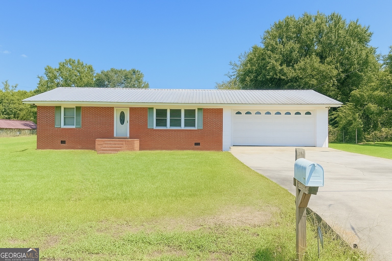Check out this all-brick home! Newly added-on great room with kitchen! Adding to the Sqft., making this home a whopping 1908 Sqft! The laundry room was made into a second bathroom, complete with standing shower. Plenty of yard to make it into a relaxing sanctuary. Back yard also features a second garage/storage shed (whichever you choose to turn it into).