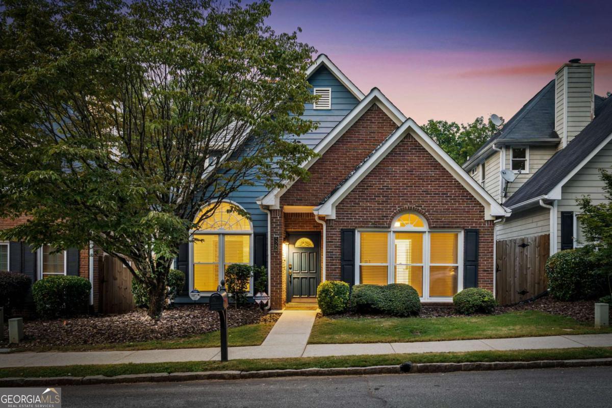 Nestled in the heart of Decatur, this smart home offers charm, comfort, convenience, and FREE super speed internet. Modern, wide plank floors, vaulted ceilings, modern light fixtures, main-level master suite, cedar-paneled walk-in closet, open kitchen with breakfast nook, and a cozy dual-sided wood-burning fireplace connecting the living and dining areas. Step out to the deck with a private, fenced backyard- perfect for unwinding. The attached, fully enclosed 2-car smart garage, with Level 2 EV charging outlet, leads straight into the kitchen. This home is packed with smart features, including an app-controlled smart lock, Ring doorbell and driveway cameras, MyQ garage opener, backyard security cameras, Ecobee smart thermostats, and a SimpliSafe security system. Energy-efficient, double-pane windows with argon gas insulation keep the home comfortable year-round. Upstairs includes two spacious bedrooms connected by a full Jack-and-Jill bathroom, each with its own private vanity. A custom-built, three-tier lighted shelving unit in the hallway adds a sleek touch and practical storage. A large walk-in attic has over 600 square feet of bonus storage space. A large laundry room with a washer and dryer is off the kitchen area. All this plus -FREE high-speed internet and lawn care. Ideally located! Walk to Glenlake Park and Downtown Decatur Square. This home offers unmatched convenience and lifestyle. Enjoy easy access to top-rated restaurants, boutiques, gyms, seasonal events, and MARTA. Plus, you're just moments from 3 grocery stores, Emory University, CHOA, CDC, Emory Decatur Hospital, and some of the area's most sought-after schools. Everything you need is right at your doorstep.