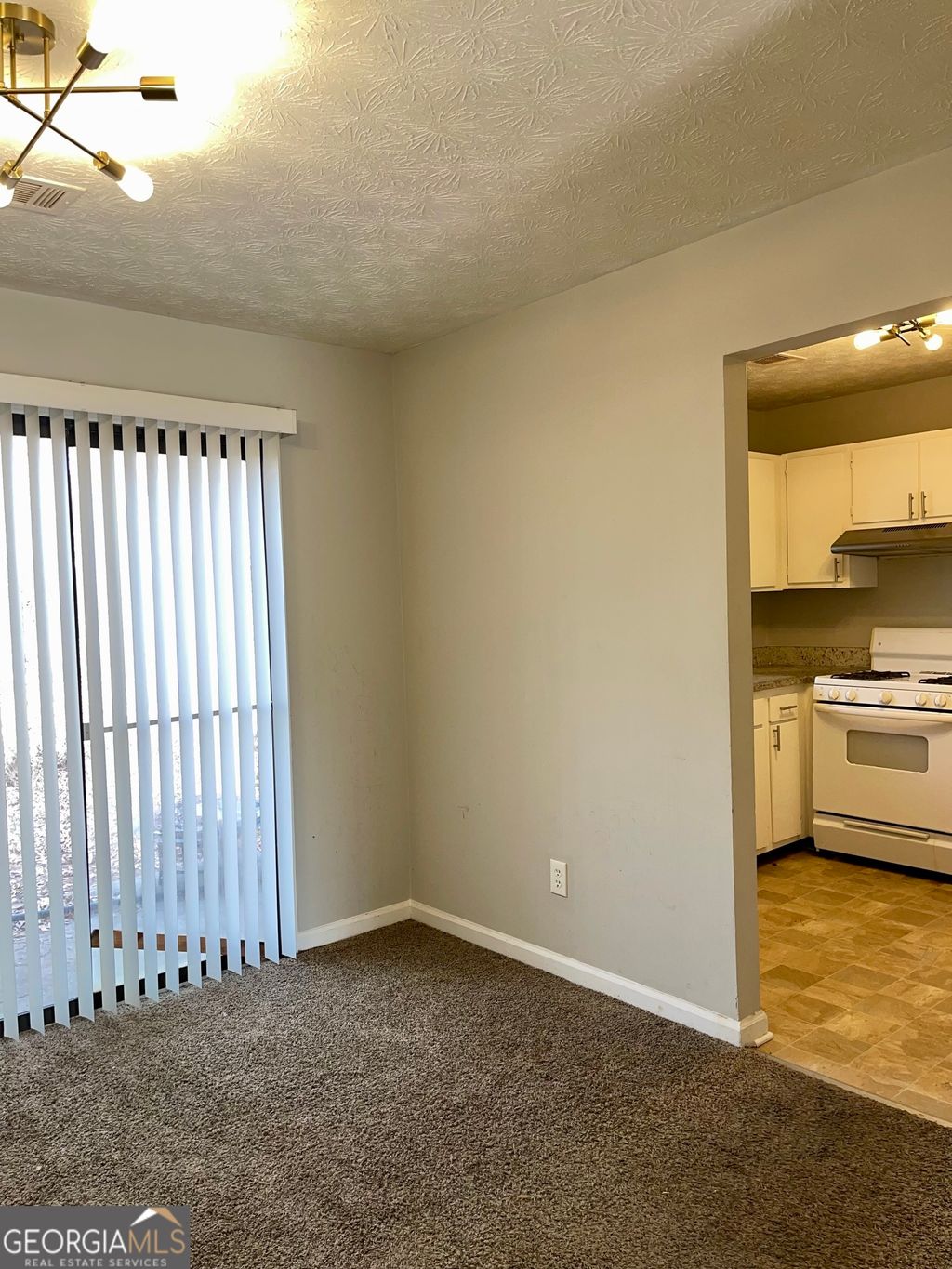 Photo of 945 Silverwood Drive, Atlanta, GA 30349 (MLS # 10792373)