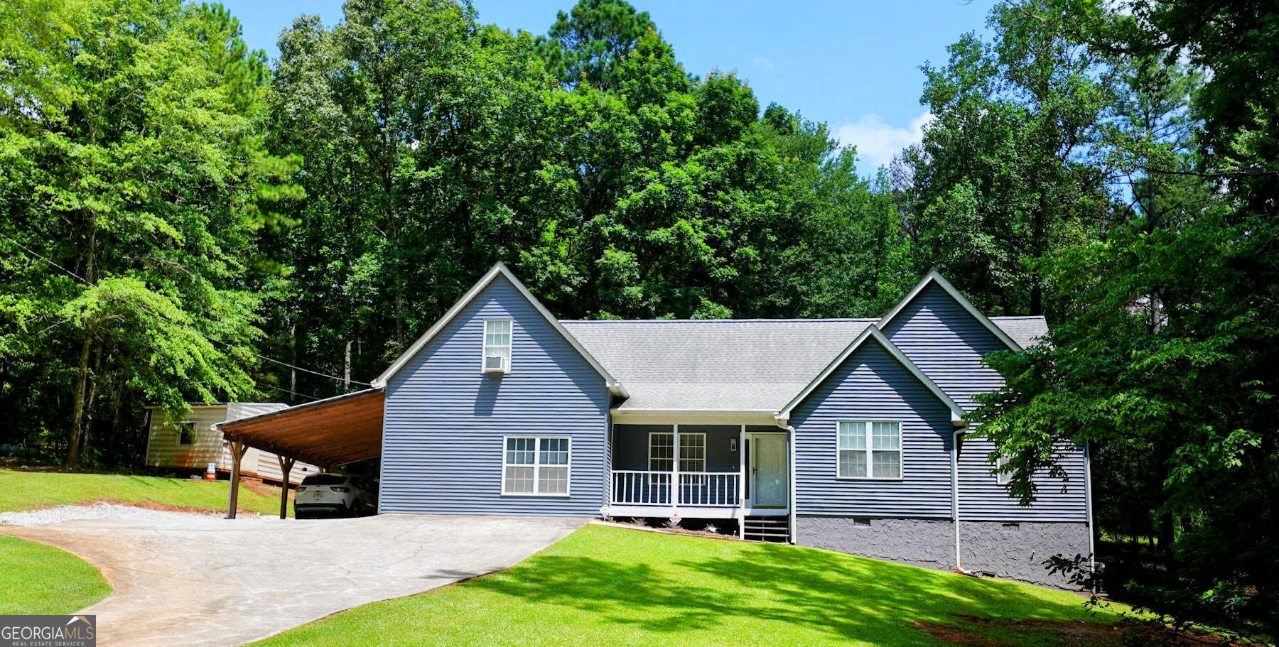 Secluded Retreat with Modern Comfort - This beautifully updated 4-bedroom, 3-bathroom home offers the perfect blend of peaceful seclusion and everyday convenience. Located in a highly desirable area of Winston, this home provides easy access to local amenities, top-rated schools, and major highways-while still giving you the tranquility of country living. This home features a gourmet kitchen with stainless steel appliances, rich wood cabinetry, sleek backsplash, and an oversized island-perfect for cooking and entertaining. Luxurious bathrooms, including a spa-like primary ensuite with dual vanities, a glass-enclosed walk-in shower, and built-in shelving for sleek storage. Bright, flexible spaces like the open office/studio with soaring ceilings and updated flooring-ideal for remote work, hobbies, or creative pursuits. Spacious and well-appointed bedrooms offer room for family, guests, or a home gym. Peaceful, wooded surroundings with plenty of room for gardening, playing, or relaxing in nature. Quiet and secluded, yet just minutes from shops, restaurants, schools, and commuter routes. Don't miss your opportunity to own this rare gem that truly offers the best of both worlds-privacy and proximity.