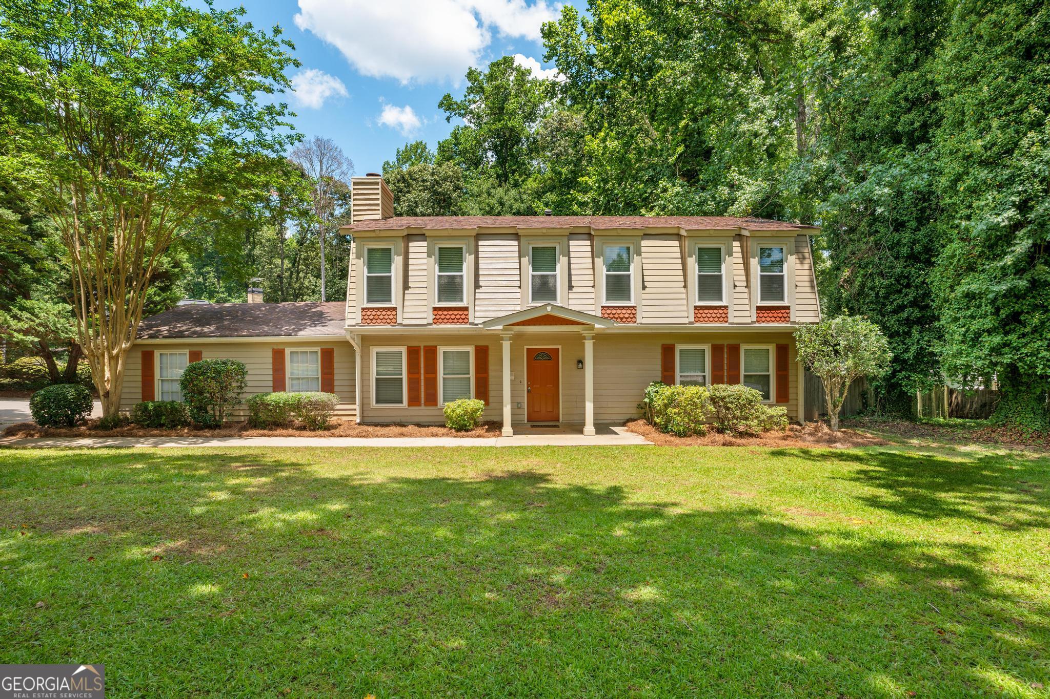 ASK US ABOUT A FREE ONE-YEAR BUY-DOWN WITH ENVOY MORTGAGE! ENJOY LIFE by your PRIVATE IN-GROUND POOL in this 4-bedroom, 2.5-bath home located in Peachtree City's desirable Kedron area-JUST MINUTES from TOP-RATED SCHOOLS, SHOPPING and GOLF CART PATHS! Built in 1975, this home offers CLASSIC charm paired with spacious indoor and outdoor living. The BACKYARD is the true highlight-featuring a private in-ground pool, lush landscaping, and a FULLY FENCED YARD, perfect for entertaining or unwinding in your own retreat. Inside, a COZY DEN with a fireplace offers flexible space for a home office, playroom, or second living area. Upstairs, one of the secondary bedrooms connects directly to the hall bath, and the primary suite includes a large walk-in closet, tiled shower, and separate soaking tub. SITUATED ON A PRIME CORNER LOT with a generous front yard, this home combines PRIVACY, FUNCTION, and LOCATION in one of Peachtree City's most established and sought-after neighborhoods.