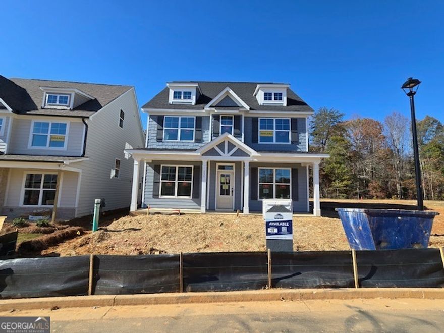 Ready in Jan 2026. Welcome to homesite 40 featuring our Abbeyville floorplan located in the highly desirable neighborhood of Marble Tree in Ball Ground. This spacious 4 bedroom, 4 bathroom plus bonus room home combines modern elegance with thoughtful design, making it the perfect retreat for comfortable family living. Conveniently located on the main level the guest bedroom is perfect for visitors, accompanied with full bath for added comfort. A dedicated office space on the main level floor provides a quiet sunlit area for work or study. The heart of the home is a gourmet kitchen featuring top of the line finishes including quartz countertops stainless steel appliances custom cabinetry and a large island ideal for casual dining. The second floor has 3 extra bedrooms including a luxurious owners suite with a spa inspired en-suite bathroom that boosts a luxury shower perfect for unwinding at the end of the day. 2 additional bedrooms share a well appointed full bath & 3rd floor features an oversized bonus room with bathroom. This home is located on a lot that backs up to natural area.