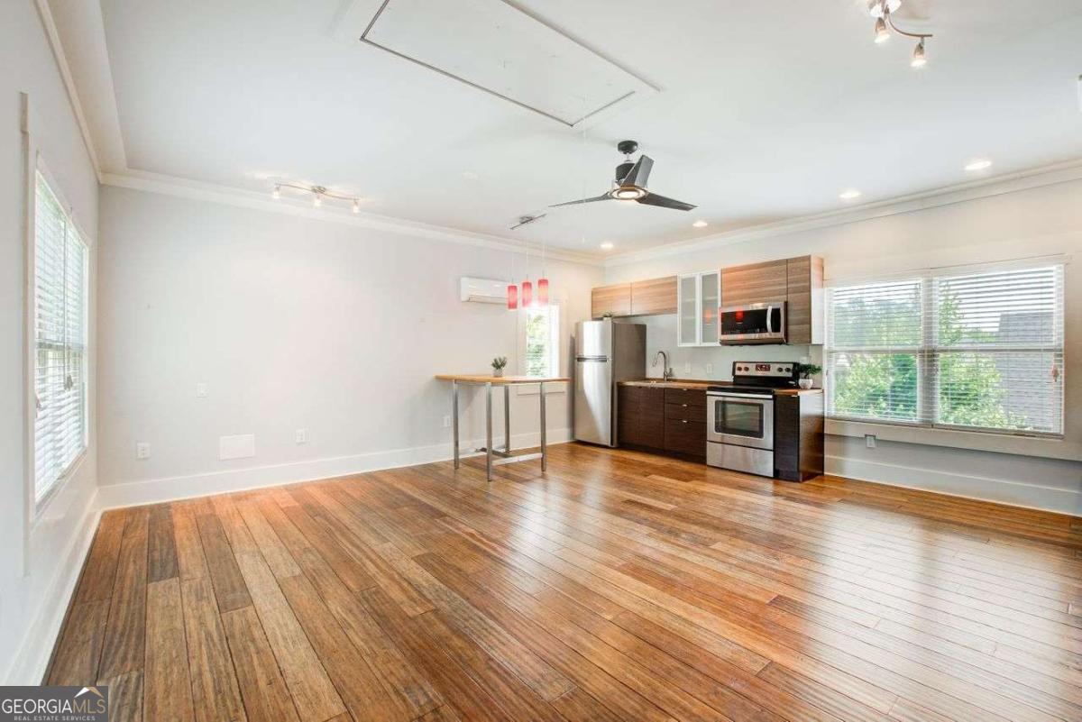 Welcome to your dream Studio Apartment above a stunning home in Smyrna! This charming and spacious loft offers everything you need for a comfortable and stylish living experience. Step inside and be greeted by an open-concept layout that seamlessly combines living, dining, and kitchen areas. The full kitchen is equipped with modern appliances, perfect for preparing delicious meals to be enjoyed with family and friends. Need a space to work from home? Look no further than the convenient office nook, providing a dedicated area for productivity and focus. Escape to your private oasis in the full bathroom, complete with a walk-in closet and laundry facilities for your convenience. You'll enjoy a separate entrance, ensuring privacy and a sense of independence. Not only will you love your new living space, but the neighborhood itself is simply breathtaking. Smyrna offers a delightful blend of natural beauty, vibrant community, and convenient amenities. From scenic parks to excellent schools and a thriving local scene, this location has it all. Don't miss out on the opportunity to call this beautiful loft apartment home. Schedule your viewing today and start living the life you've always dreamed of!