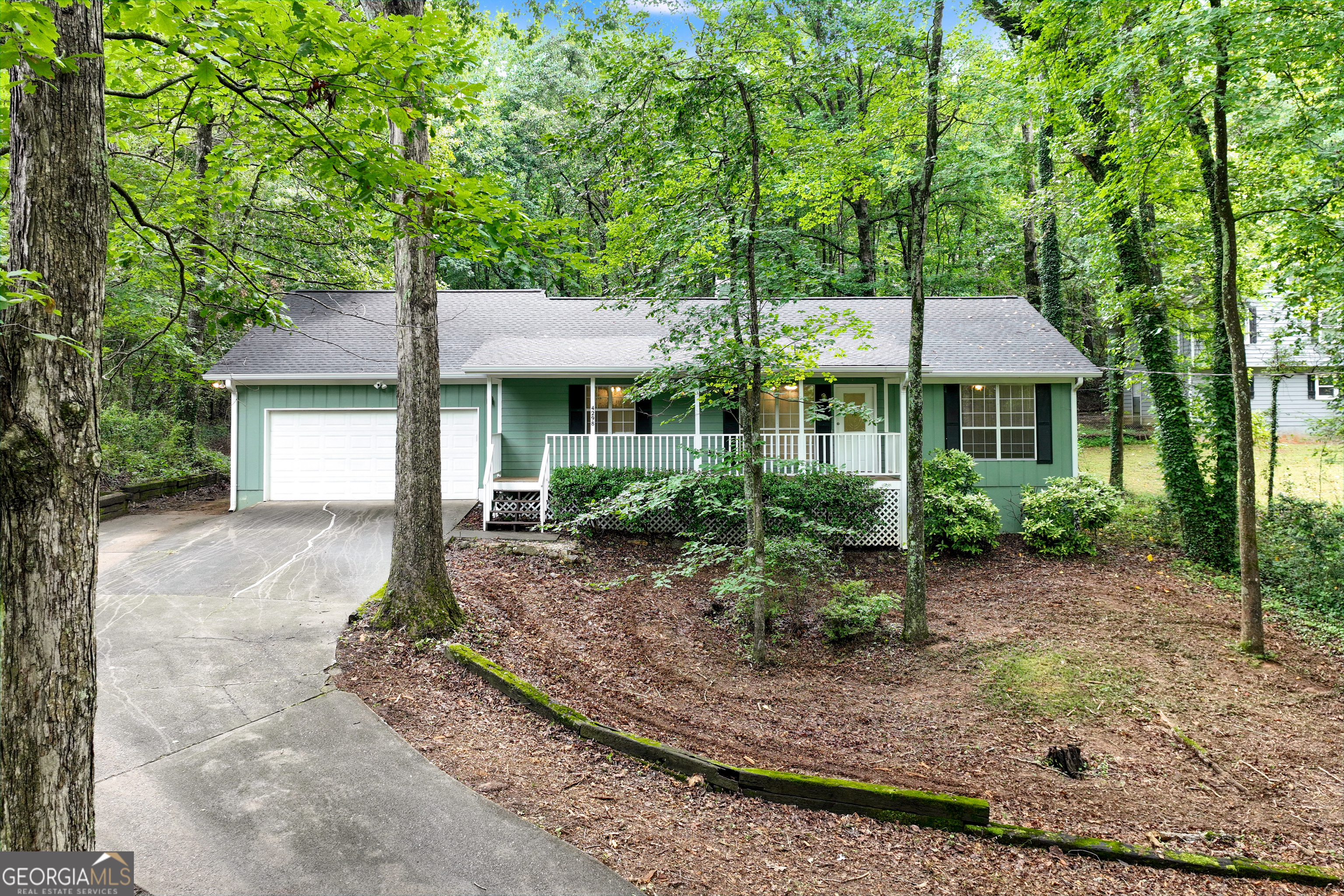 Discover COMFORT AND CONVENIENCE - ALL IN ONE PLACE. This 3 bedroom, 2 bath ranch invites you to enjoy a seamless blend of indoor comfort and outdoor serenity. Whether you're hosting game night on the screened porch or taking in the quiet, peaceful backyard, this is the kind of living that just makes sense. Freshly painted throughout, this home is move-in ready and waiting for you to make it your own. Nestled on a wooded lot, the setting offers the peace you crave with the practicality you need. TAKE THE NEXT STEP - schedule your private showing today and experience the ease of smart, simplified living.
