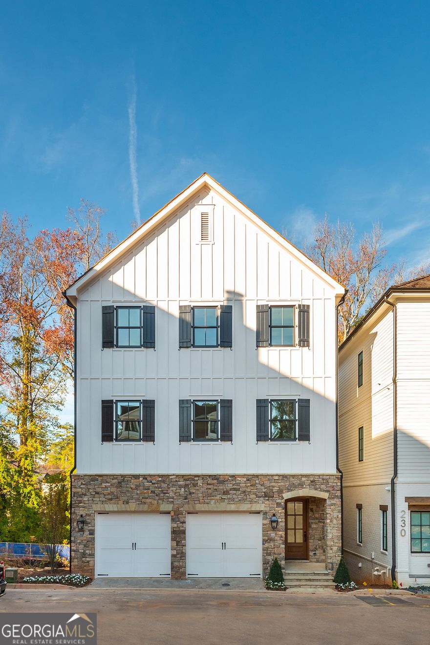 Welcome to your dream home in the heart of Downtown Alpharetta! Nestled on the prestigious Alpharetta Loop, this property promises an exceptional lifestyle with its prime location between Historic Alpharetta & Avalon and impressive features. This magnificent 4-story single family residence with elevator offers the perfect blend of quality, comfort, and convenience. Basement level is  versatile with bedroom and full bath that can be Ideal for a home gym, media room, or additional living space, LTV flooring, possible bar addition, storage closet has ample space for outdoor equipment, bikes chairs, etc. for easy access to the outdoor porch or the loop. Terrace Level has Foyer with Entertainment Hub perfect for hosting gatherings including bar area with easy access to outdoor balcony with full bath and large 2 car garage, Main level has Gourmet Kitchen: State-of-the-Wolf and Sub -Zero appliances, granite countertops, and a large island for culinary enthusiasts, with scullery. Open concept with Large dining area and family room with fireplace that has large doors that open out to the balcony overlooking the Loop with the most beautiful views and charming spot to enjoy morning coffee or evening sunsets. Second story includes a Luxurious Owners' Suite  with doors opening to the balcony. This suite  features a spacious bedroom, 2 walk-in closets, and a spa-like en-suite bathroom with a soaking tub and shower. Laundry Room: Conveniently located near the bedrooms for easy access. Guest Suite is like a private retreat for visitors with a full bathroom. This exquisite home is designed for those who appreciate quality, style, and convenience with multiple outdoor spaces to relax and enjoy the beautiful surroundings. Enjoy the vibrant lifestyle with easy access to shops, restaurants, parks, and top-rated schools. Several photos in this listing are virtually staged.
