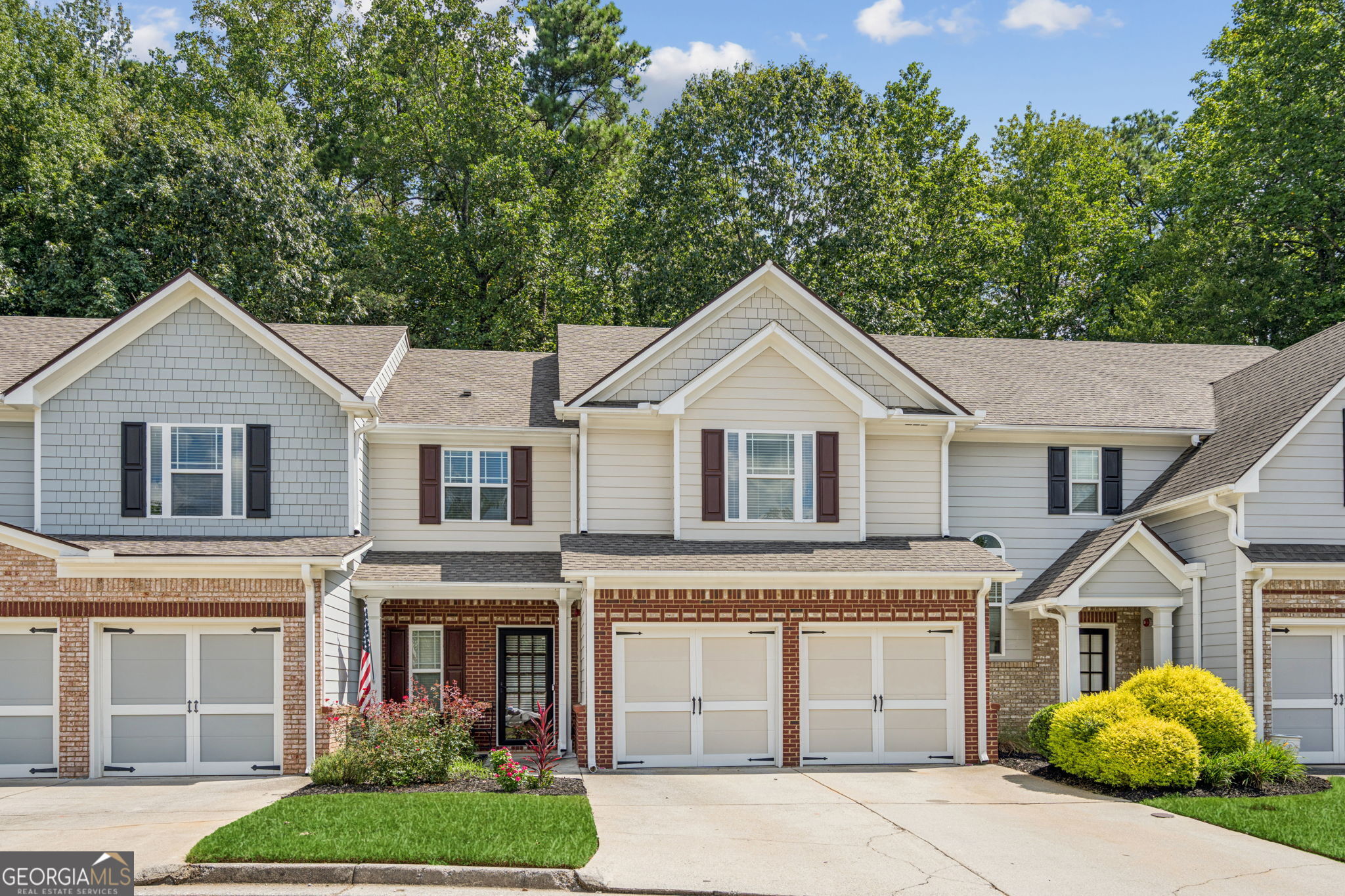 Location! Elegance! Style! Convenience! All in one fabulous home. Perfectly located 2 miles from the Marietta Square, and close to Life University, Kennesaw State University, Dobbins AFB, Cobb County International Airport, shopping, schools, major thoroughfares for ease of travel in an around the city, or north to the mountains. Just 35 minutes to the Atlanta Airport, less than 20 minutes to Truist Stadium for a Braves game, and less than 20 minutes to Kennesaw Mountain to enjoy the scenery and fresh air. All this in the quiet, peaceful, and meticulously maintained gated community of Brownstone Square. Step into over 2100 sq.ft of modern elegance with this beautifully updated three-bedroom, 2.5-bathroom town home. The home exudes class and style while boasting a sleek modern vibe with a new stainless-steel range and dishwasher, smart door openers, a new water heater, and plantation shutters that allow for great natural light. The exterior was freshly painted in 2023, and the interior received stylish and extensive updates in 2022, including new carpet and LVP flooring, and fresh paint throughout in 2024. Enjoy the convenience of a new storm door and contemporary fixtures (with dimmers) on the main level, along with advanced ecobee thermostats. The over-sized primary bedroom is a true retreat, featuring a luxurious new shower, double vanity, soaking tub, and a generous walk-in closet. Residents can also take advantage of the community pool, adding a touch of leisure to this contemporary gem. The peacefulness and serenity of this community only add to the attraction of this beautiful, upgraded, and well-cared-for home.