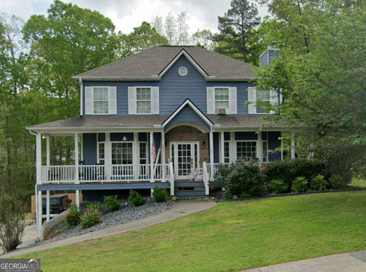 If you're looking for the country living but still have that neighborhood living feel, check out this Huge 5 Bedroom/2.5 Bath, 2-story home. As soon as you walk up on the front porch you will have plenty of room for rocking chairs to be able to enjoy the outdoors. Once entering you will have an open concept for the dinning and kitchen area with a nice size kitchen island, just off to the side you have a breakfast den. Spacious living room with half bath that can be upgraded with a shower. Living room offers a factory-built gas fireplace for those cooler nights. Upper-level features 4 Bedrooms/2 Baths with laundry room upstairs for easier access. Primary bedroom is spacious with the bathroom offering double vanity sink, soaking tub and separate shower. Extra bathroom has been partially remodeled. Basement has 2 finished rooms with 1 being an extra bedroom with closet space and easy access to outside. The 2nd finished room is perfect for a gaming room or whatever you choose. Back deck is ready to be screened in so you can enjoy sitting on the back porch, along with an extra decking area for grilling. Backyard is partially fenced and can be finished to have a complete fenced in backyard. This community offers a pool, tennis courts and pickleball courts. Just minutes away from downtown Rockmart and only 45 minutes from the Atlanta airport. Don't pass up this amazing opportunity.