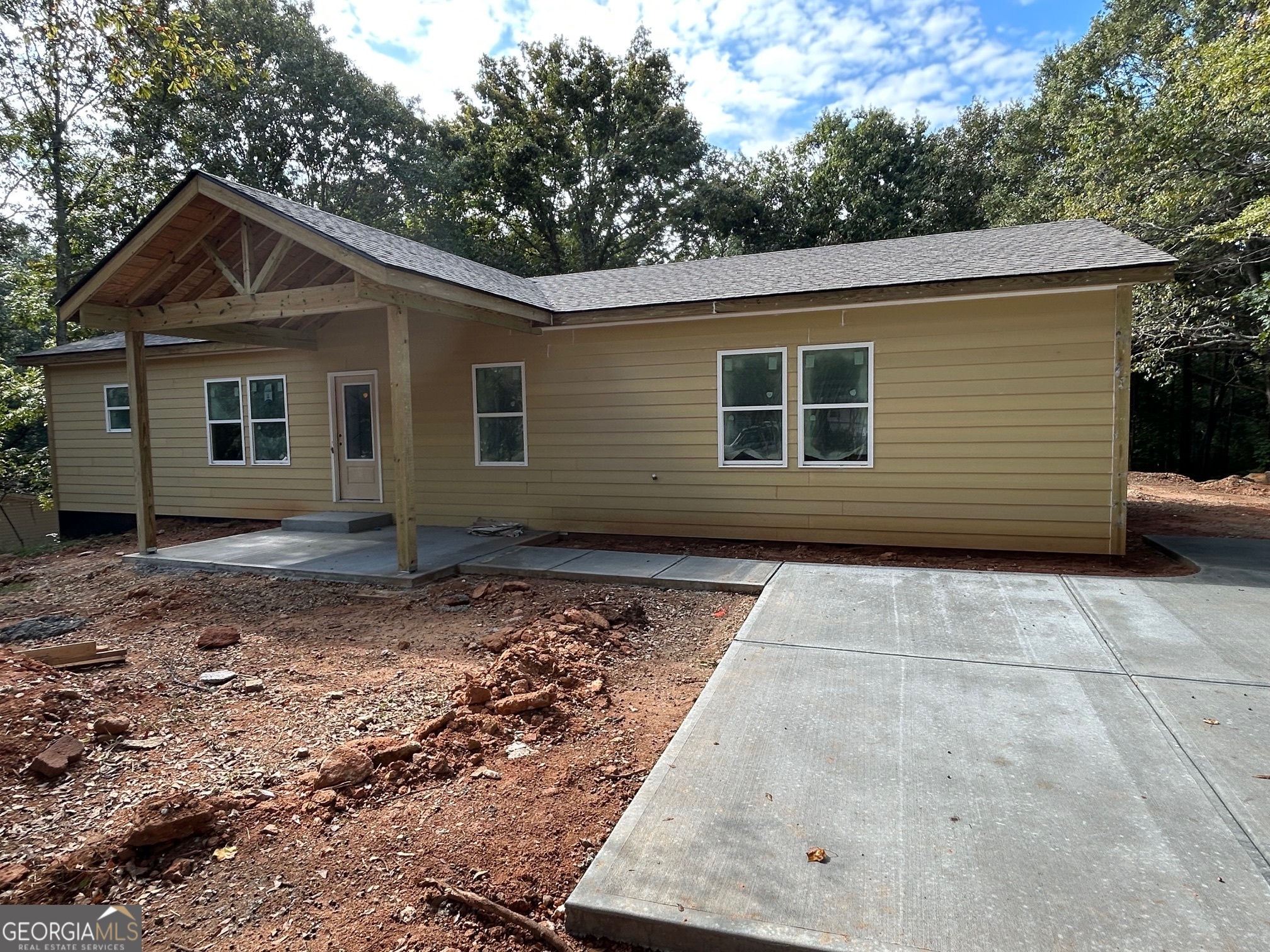 Brand New Construction! Scheduled for Completion 11/01/2025. This 3 bedroom 2 bath house sits on a .62 acre level lot and has plenty of room for the entire household. Large Great room with direct sight to the kitchen and dining room - ideal for large gatherings. Upgraded laminate vinyl flooring throughout. The kitchen has custom made hardwood cabinets - to include a large pantry, granite countertops, tile backsplash and complete with Stainless Steel appliances to include Gas Range, Dishwasher and Side by Side Refrigerator with Ice Maker. Oversized Master bedroom with large entry way has a walk in closet that is wheelchair accessible. Master bathroom has large shower, double vanity and built in linen closet. Split bedroom plan with oversized bedrooms, walk in closets and bathroom has granite countertops and hardwood cabinets as well. Dedicated laundry room with decorative barn door. All interior doorways have oversized entrances. Large front and back yard and back deck - great for grilling & entertaining. Concrete driveway with parking pad. Public water. Less than 3 minutes from downtown Winder. Comes with 1 year Builder Warranty. Updated Interior & Exterior photos will be added.