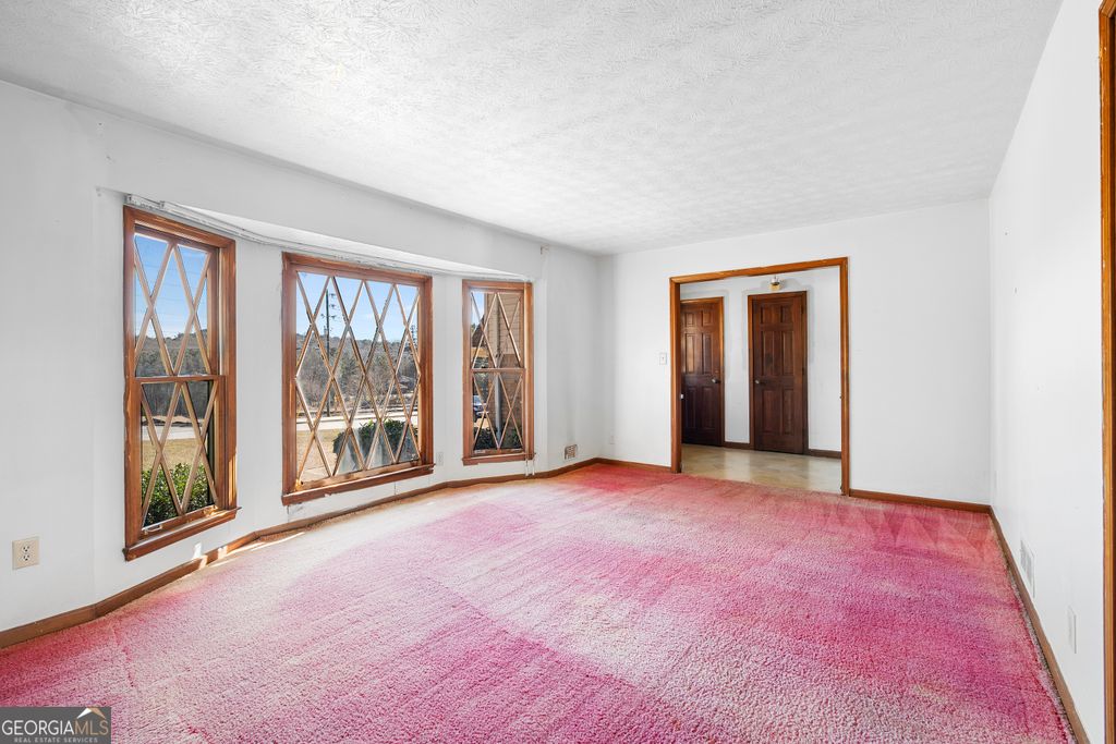 Photo of 5083 Flakes Mill Road, Ellenwood, GA 30294 (MLS # 10699084)